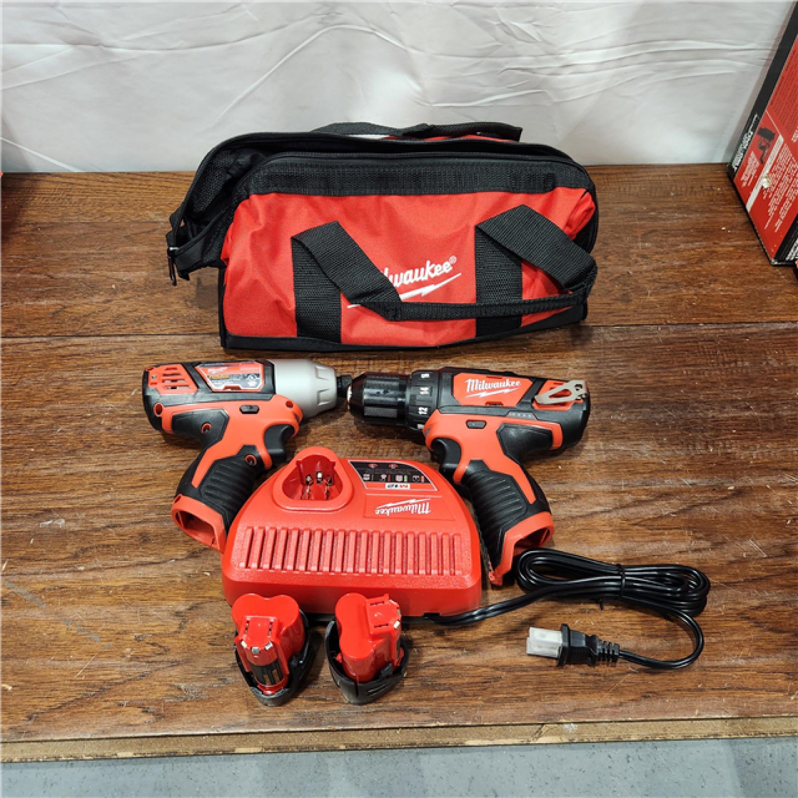 AS-IS M12 12V Lithium-Ion Cordless Drill Driver/Impact Driver Combo Kit with Two 1.5Ah Batteries, Charger and Bag (2-Tool)