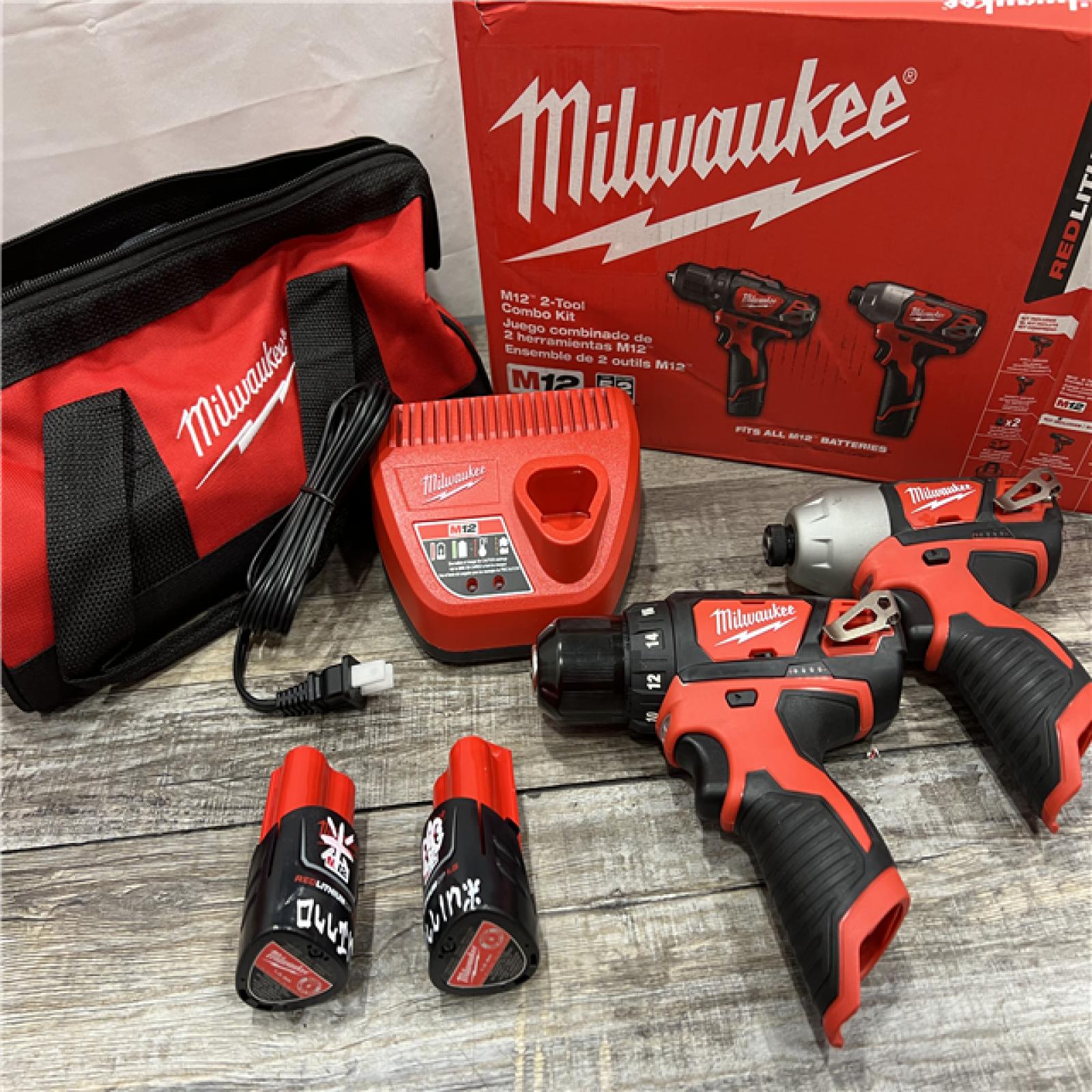 AS-IS Milwaukee 2494-22 M12 Cordless Combination 3/8  Drill / Driver and 1/4  Hex Impact Driver Dual Power Tool Kit (2 Lithium Ion Batteries  Charger  and B