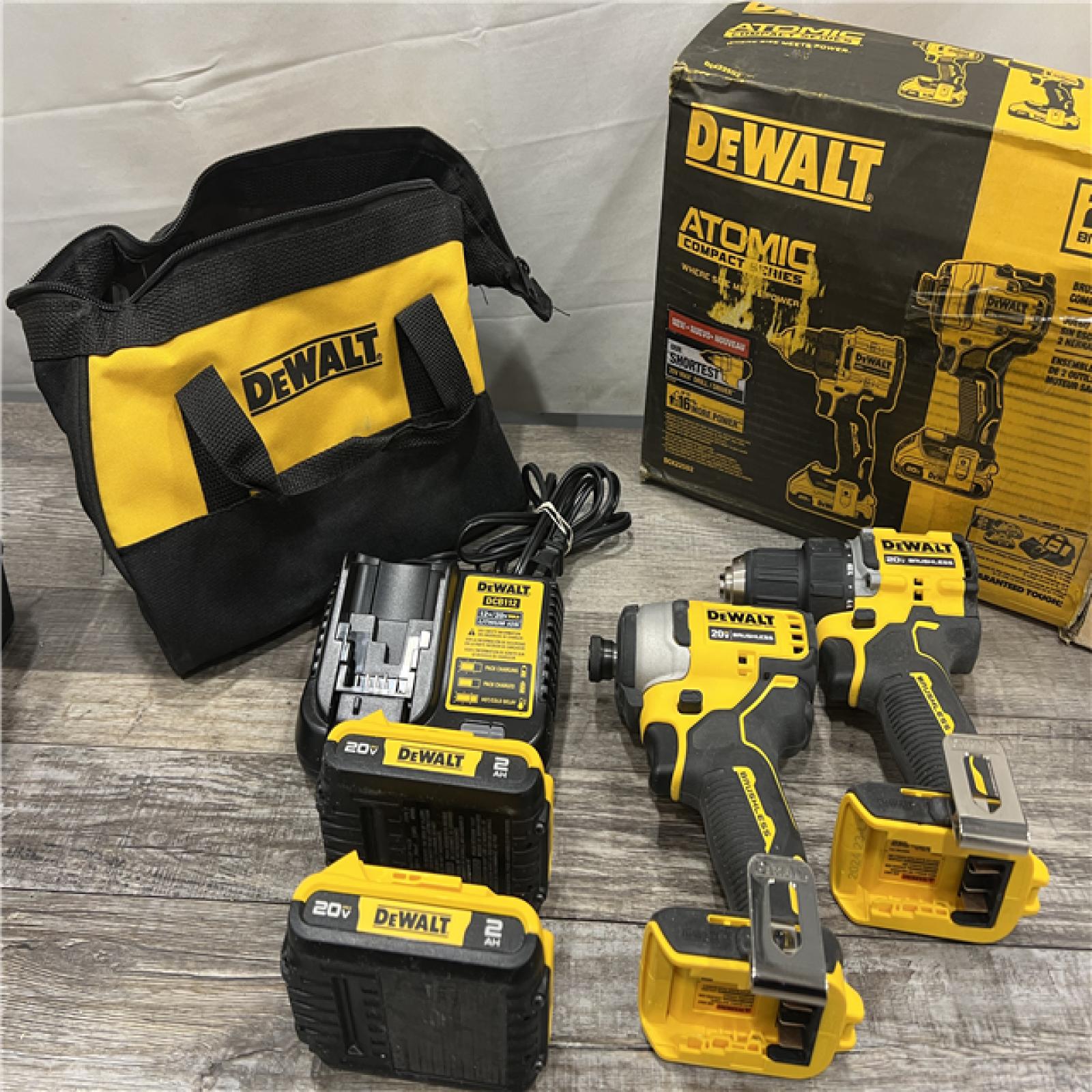 AS-IS Dewalt DCK225D2 20V MAX ATOMIC Brushless Compact Lithium-Ion 1/2 in. Cordless Drill Driver and 1/4 in. Impact Driver Combo Kit with 2 Batteries 2 Ah