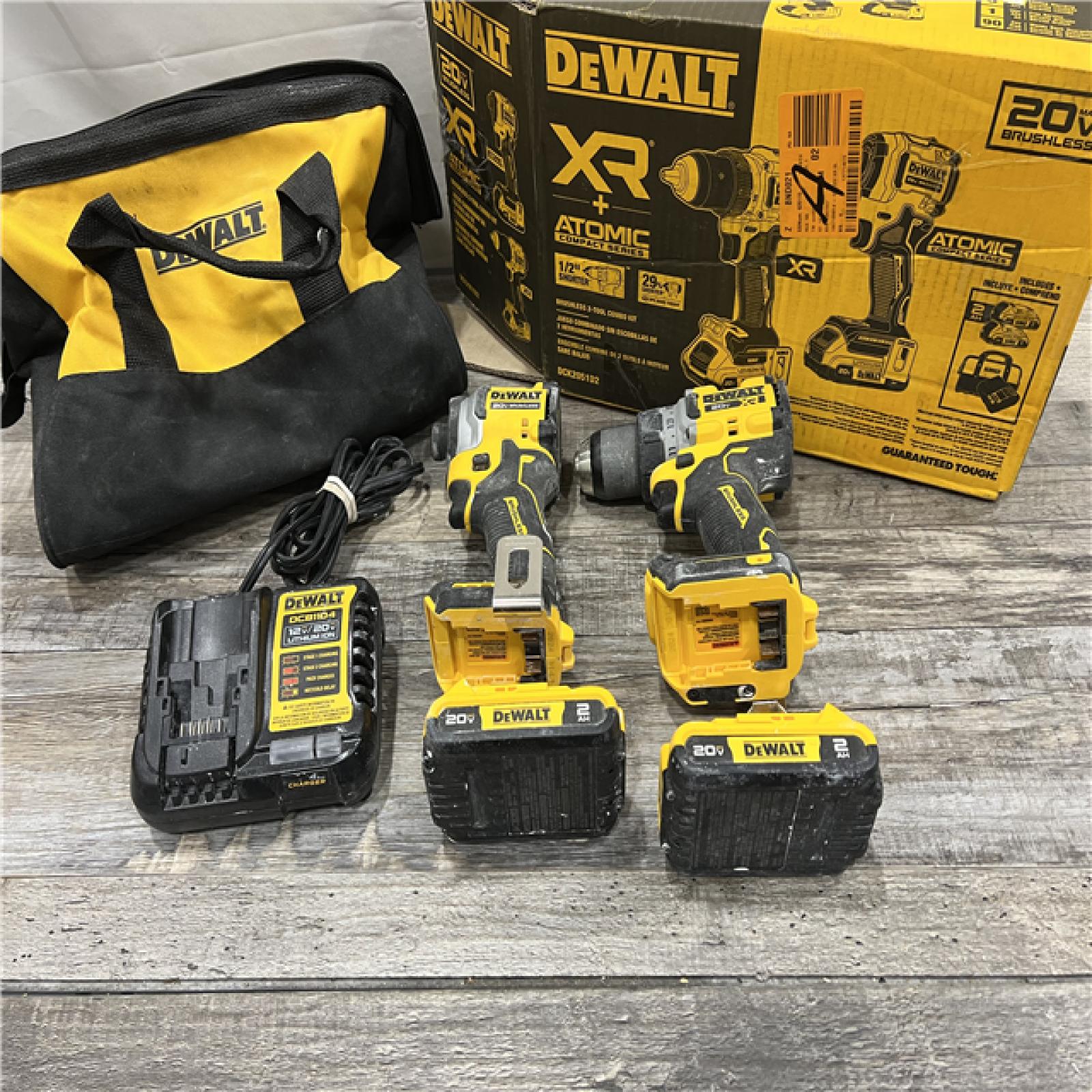 AS-IS DEWALT 20V MAX XR Cordless Drill/Driver, ATOMIC Impact Driver 2 Tool Combo Kit, (2) 2.0Ah Batteries, Charger, and Bag