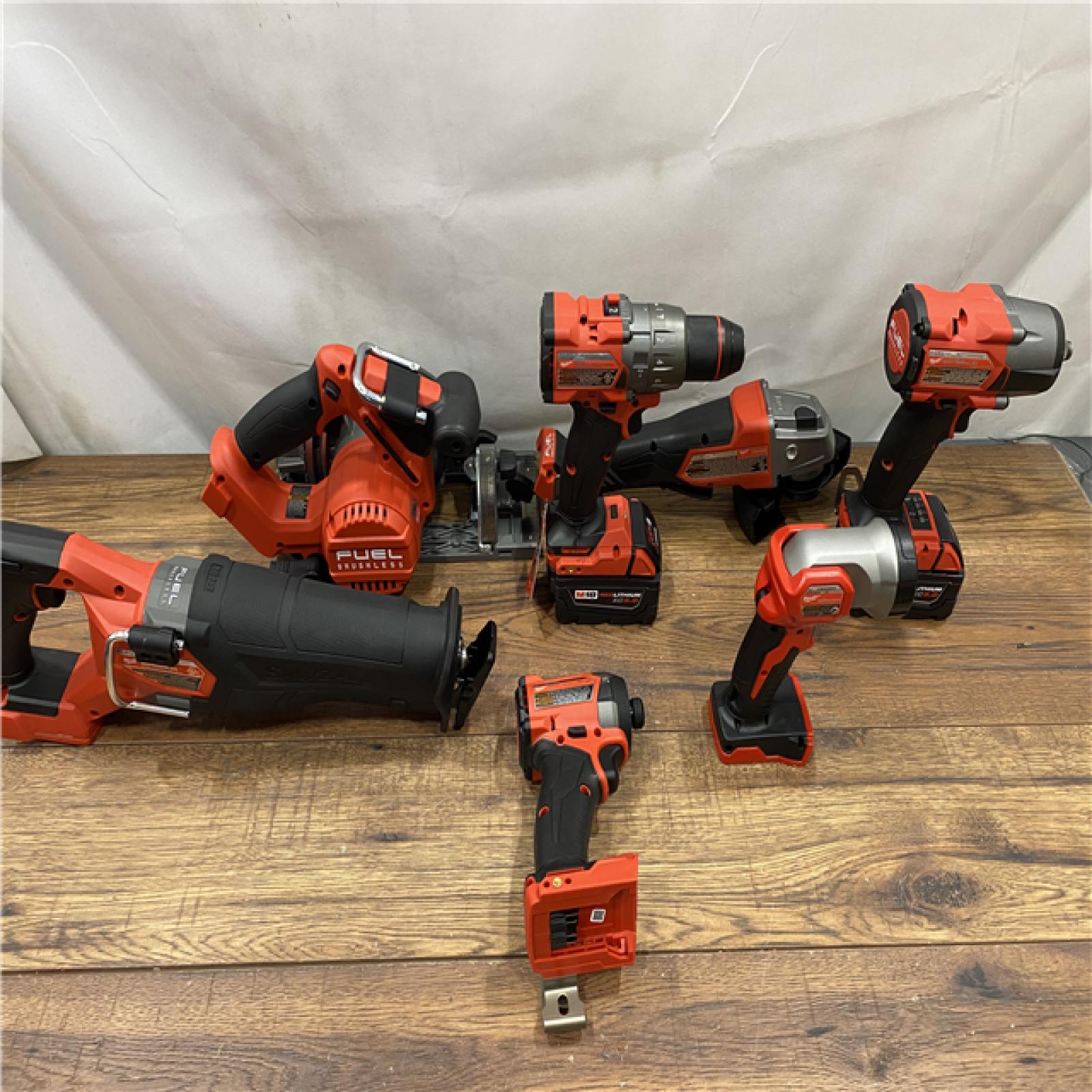 AS IS Milwaukee M18 FUEL 18V Lithium-Ion Brushless Cordless Combo Kit with Two 5.0 Ah Batteries  1 Charger  2 Tool Bags (7-Tool)