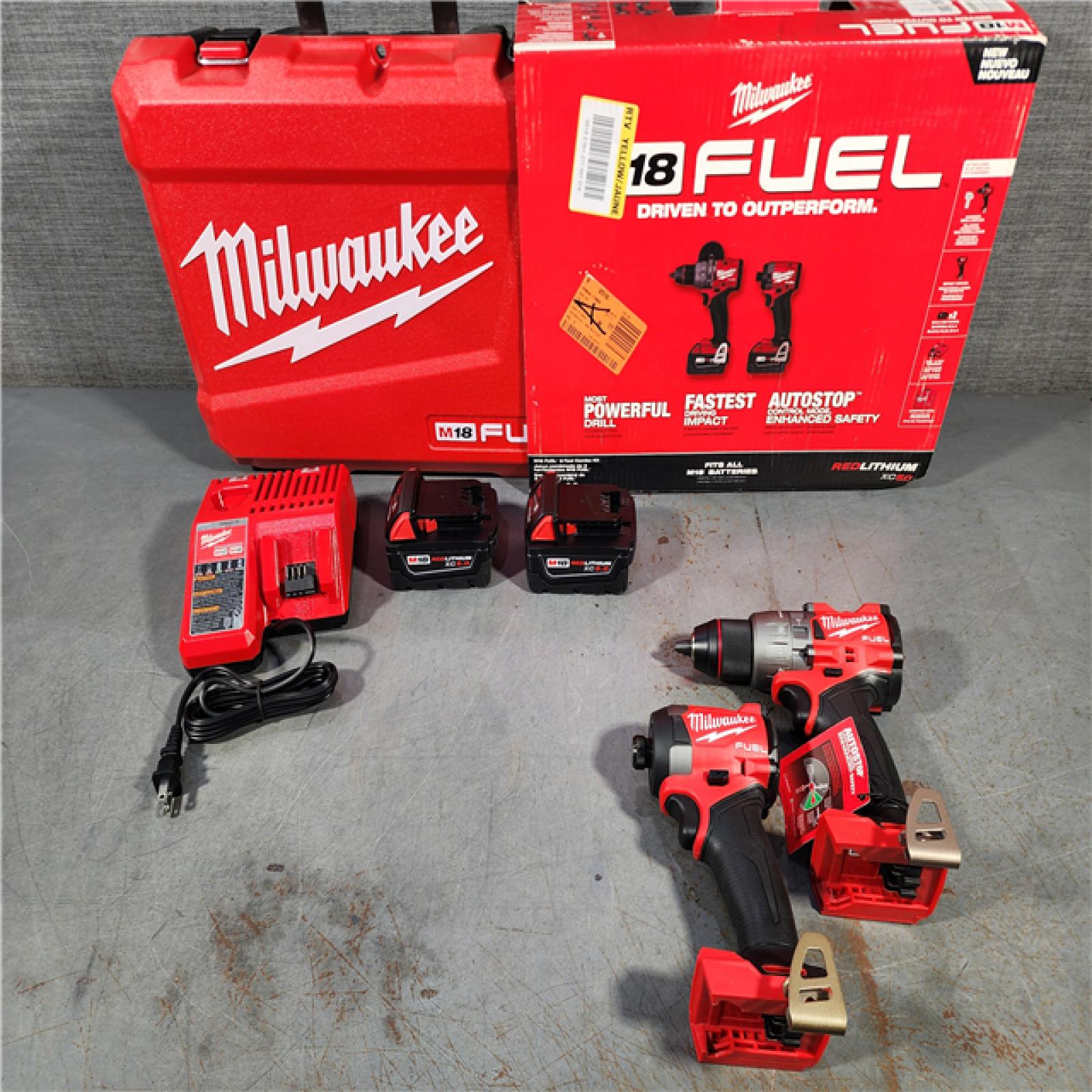 HOUSTON LOCATION - AS-IS (APPEARS LIKE NEW) Milwaukee M18 FUEL 18V Lithium-Ion Brushless Cordless Hammer Drill and Impact Driver Combo Kit (2-Tool) with 2 Batteries