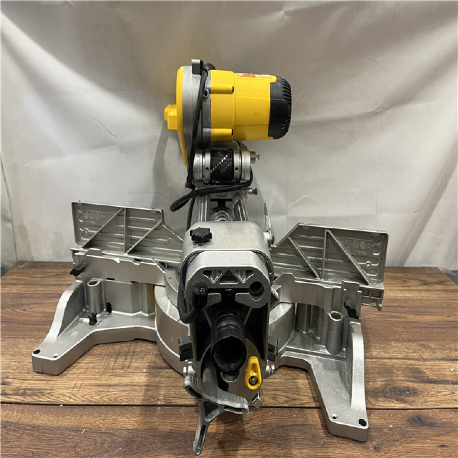 AS IS DEWALT 15 Amp Corded 12 in. Double Bevel Sliding Compound Miter Saw with XPS Technology, Blade Wrench and Material Clamp