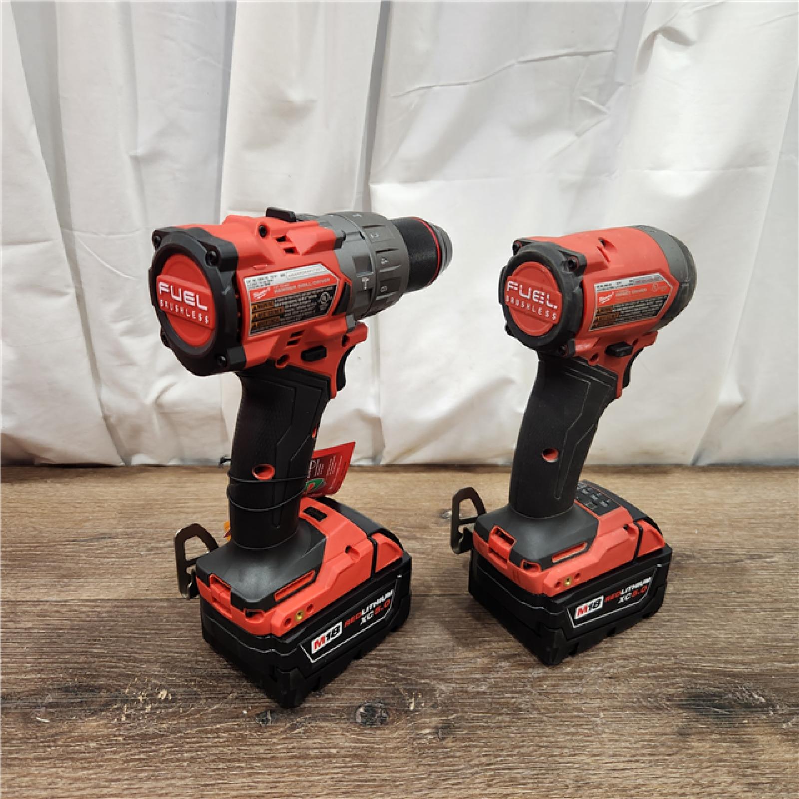 AS-IS Milwaukee M18 FUEL 18V Lithium-Ion Brushless Cordless Hammer Drill and Impact Driver Combo Kit (2-Tool) with 2 Batteries