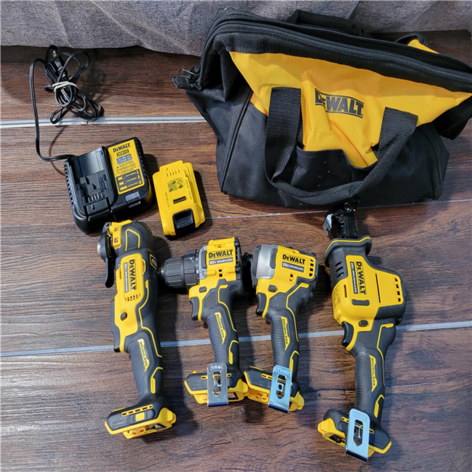 California As-Is Dewalt Brushless 4-Tool Combo Kit (Battery,Charger, and Tool Bag Included)