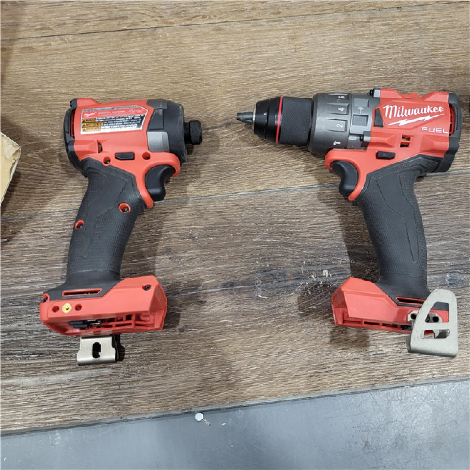 AS-IS Milwaukee M18 FUEL 18V Lithium-Ion Brushless Cordless Hammer Drill and Impact Driver Combo Kit (2-Tool) with 2 Batteries