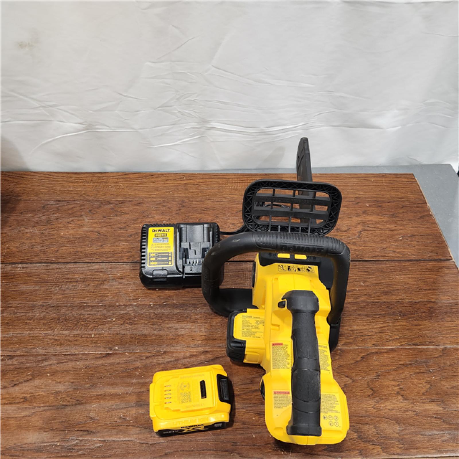 AS-IS Dewalt 7605686 12 in. 20V Battery Powered Chainsaw