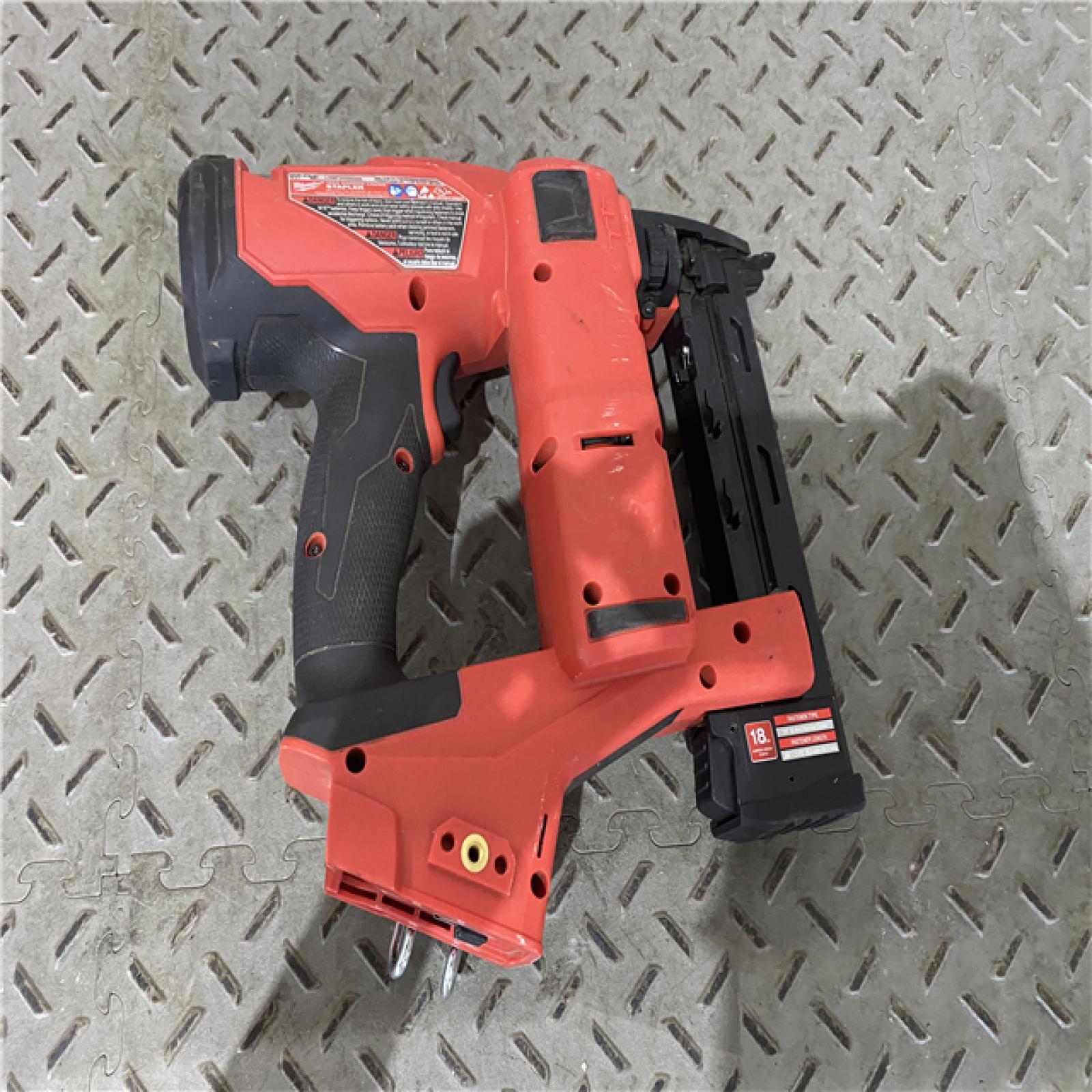 Houston location AS-IS MILWAUKEE M18 FUEL 18-Volt Lithium-Ion Brushless Cordless 18-Gauge 1/4 in. Narrow Crown Stapler (Tool-Only)