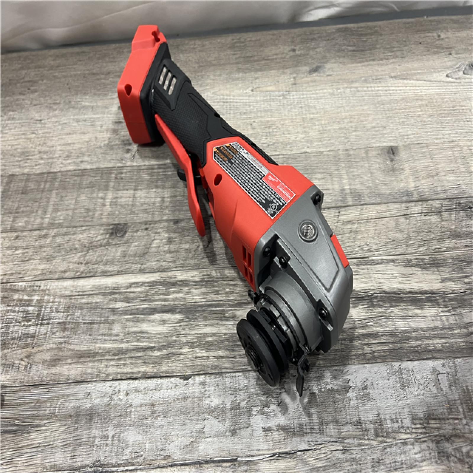 AS-IS Milwaukee 2880-20 M18 FUEL 18-Volt Lithium-Ion Brushless Cordless 4-1/2 in./5 in. Grinder W/Paddle Switch (Tool-Only)