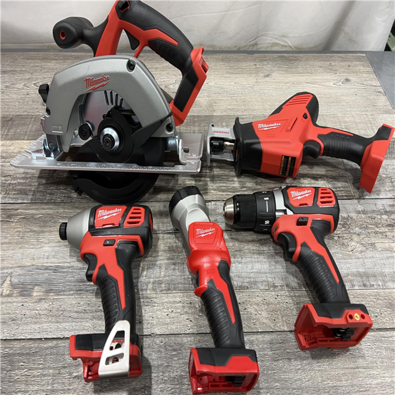 AS-IS Milwaukee M18 18-Volt Lithium-Ion Cordless Combo Tool Kit (5-Tool) with (1) 3.0Ah and (1) 1.5Ah Battery, (1) Charger, (1) Tool Bag