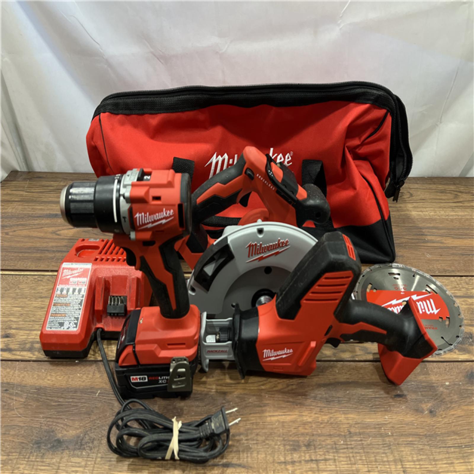 AS IS Milwaukee M18 18-Volt Lithium-Ion Brushless Cordless Combo Kit (4-Tool) with 2-Batteries, 1-Charger and Tool Bag