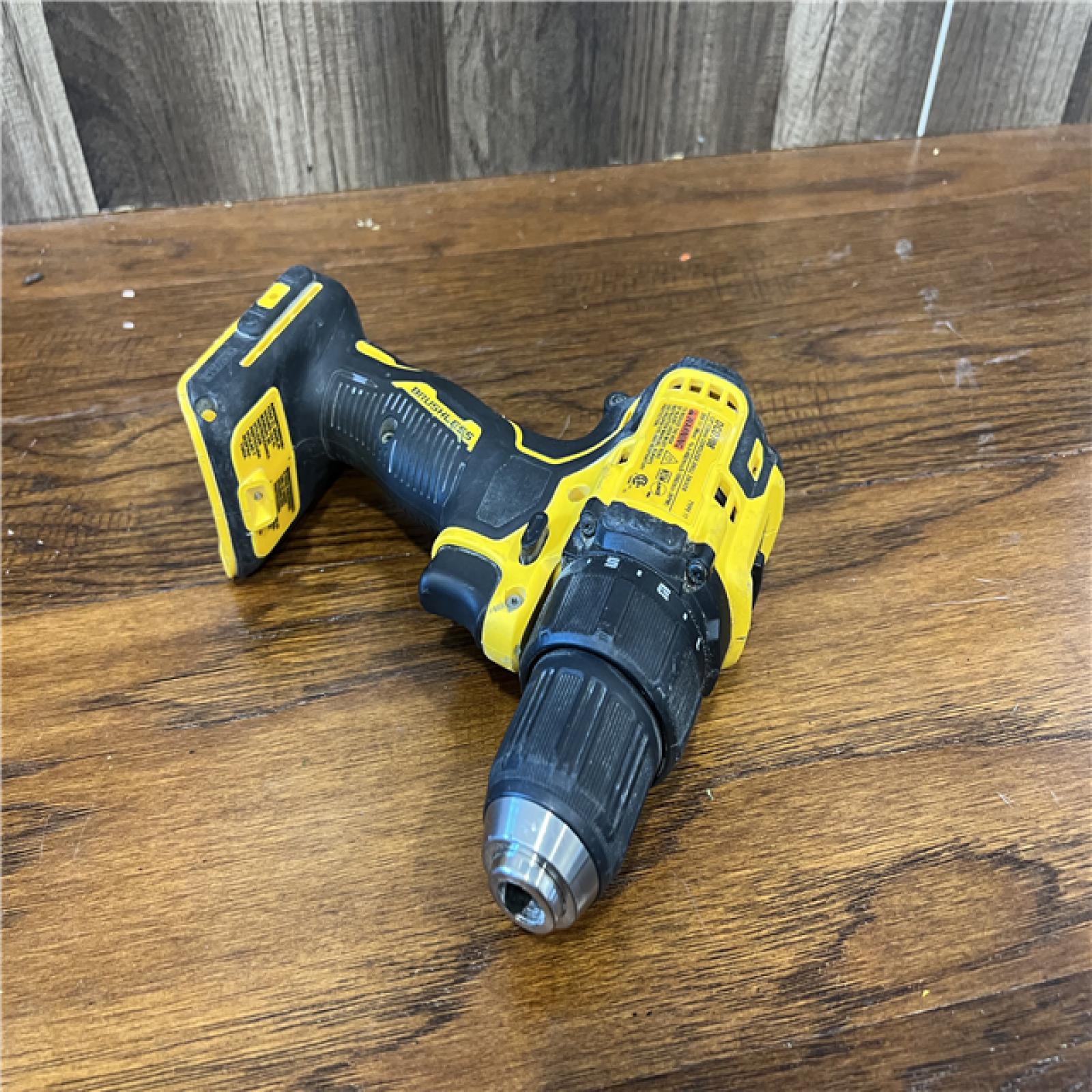 AS-IS DEWALT ATOMIC 20V Max Lithium-Ion Brushless Cordless Compact 1/4 in. Impact Driver Kit with 2.0Ah Battery, Charger and Bag