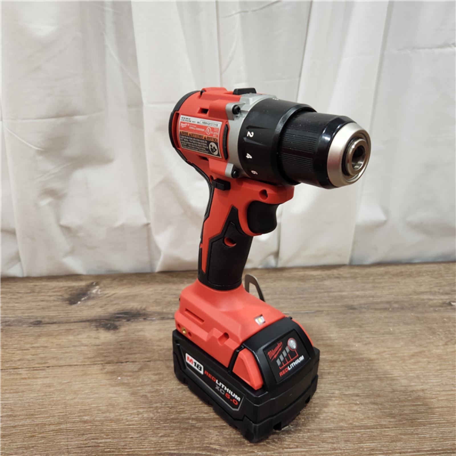 AS-IS Milwaukee  M18 18-Volt Lithium-Ion Brushless Cordless 1/2 in. Compact Drill/Driver with M18 5.0Ah Battery and Charger