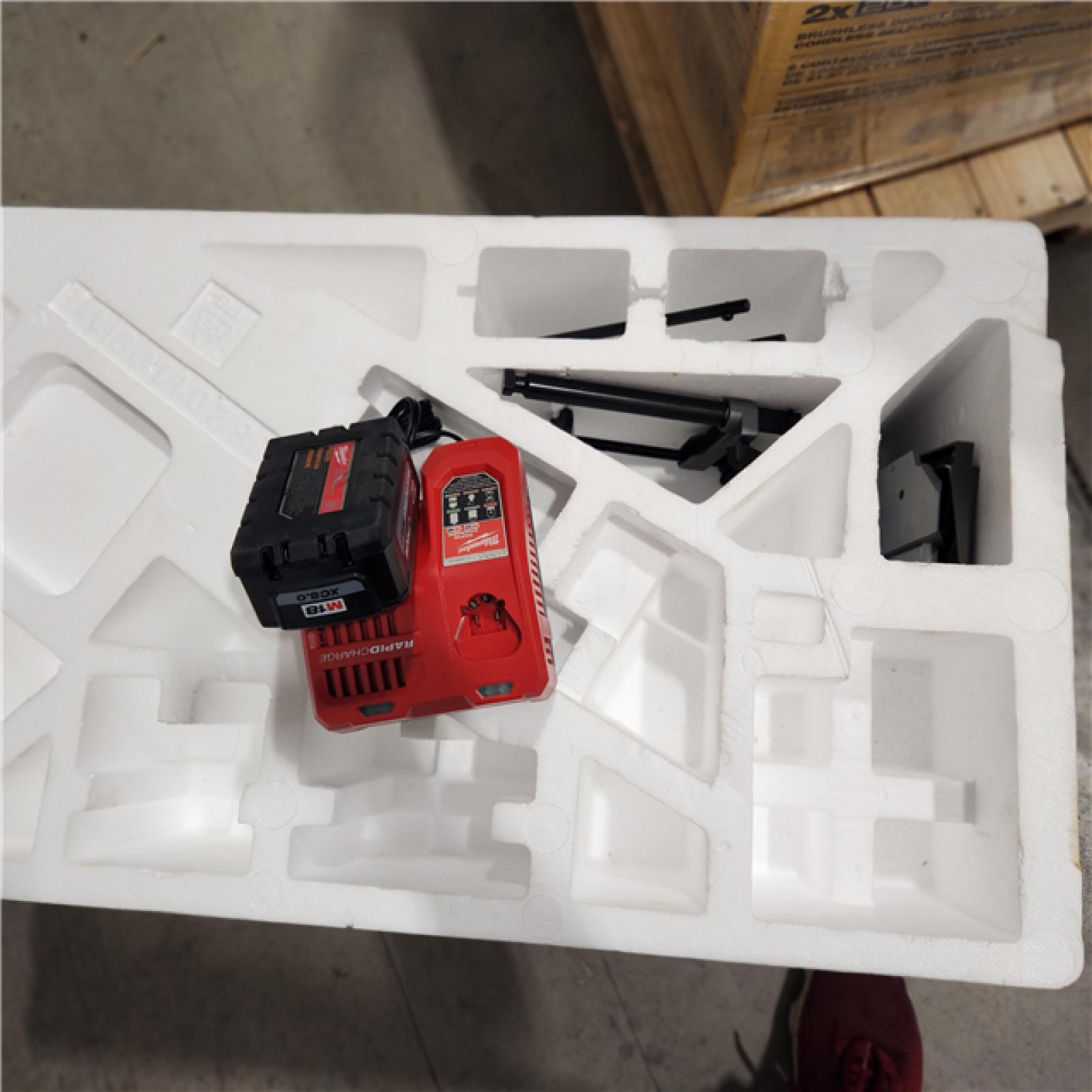 As-Is  Milwaukee M18 FUEL Cordless Brushless Dual-Bevel Sliding Compound 10 in. Miter Saw Kit