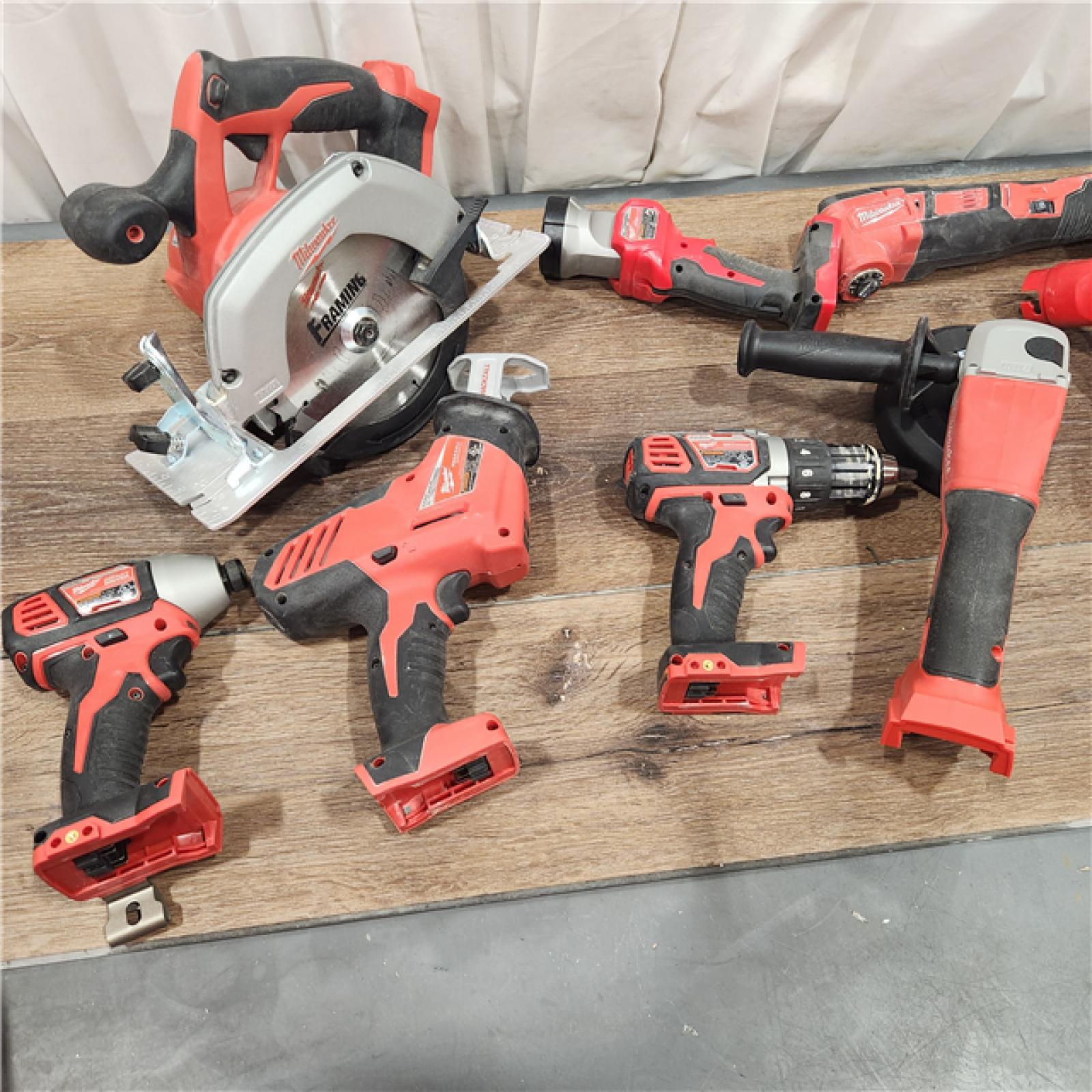 AS-IS M18 18-Volt Lithium-Ion Cordless Combo Kit (9-Tool) with (2) Batteries, Charger, and Tool Bag