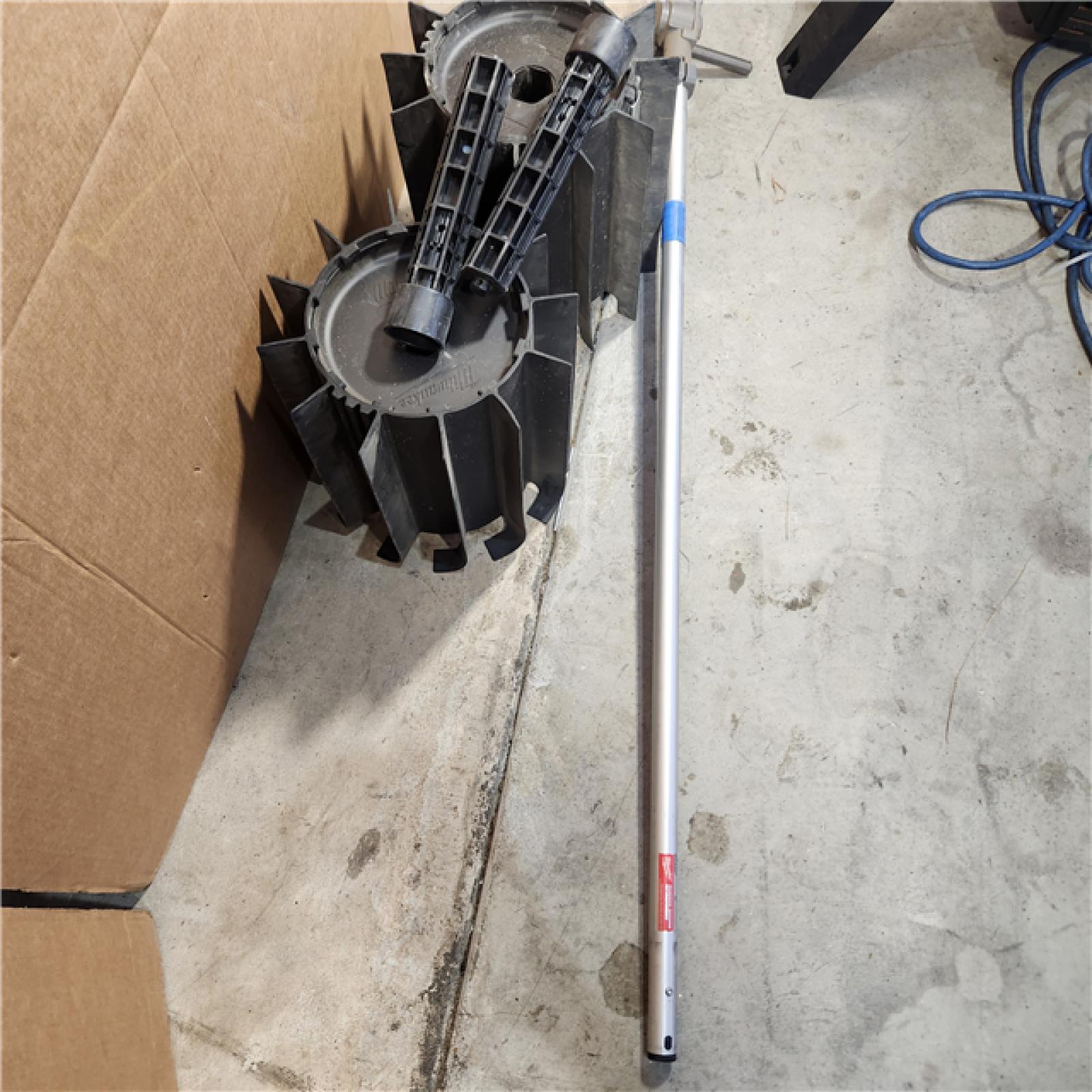 Houston location- AS-IS MILWAUKEE M18 FUEL QUIK-LOK Rubber Broom Attachment