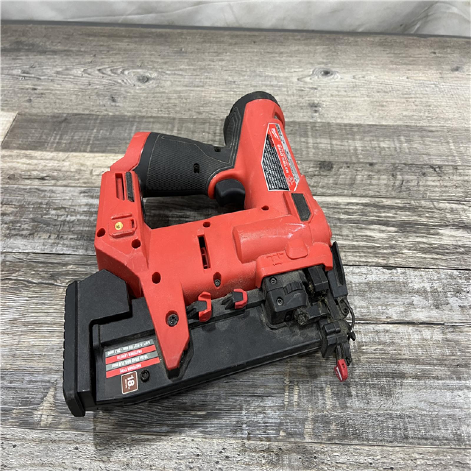 AS-IS MILWAUKEE M12 FUEL 12-Volt Lithium-Ion Brushless Cordless 18-Guage Compact Brad Nailer (Tool Only)