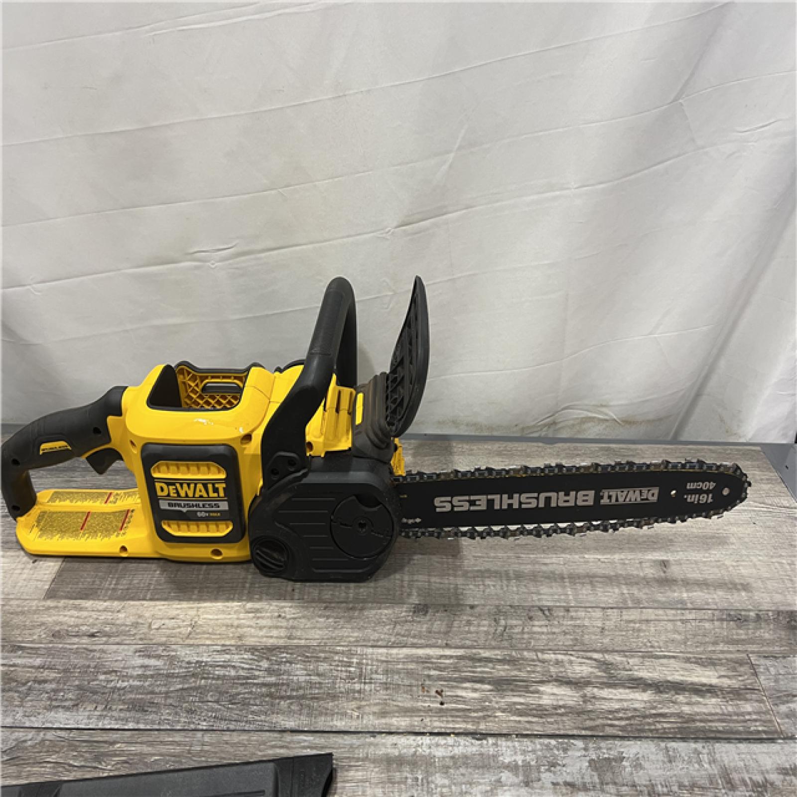 AS-IS DEWALT  FLEXVOLT 60V MAX 16in. Brushless Cordless Battery Powered Chainsaw Kit with (1) FLEXVOLT 2 Ah Battery & Charger