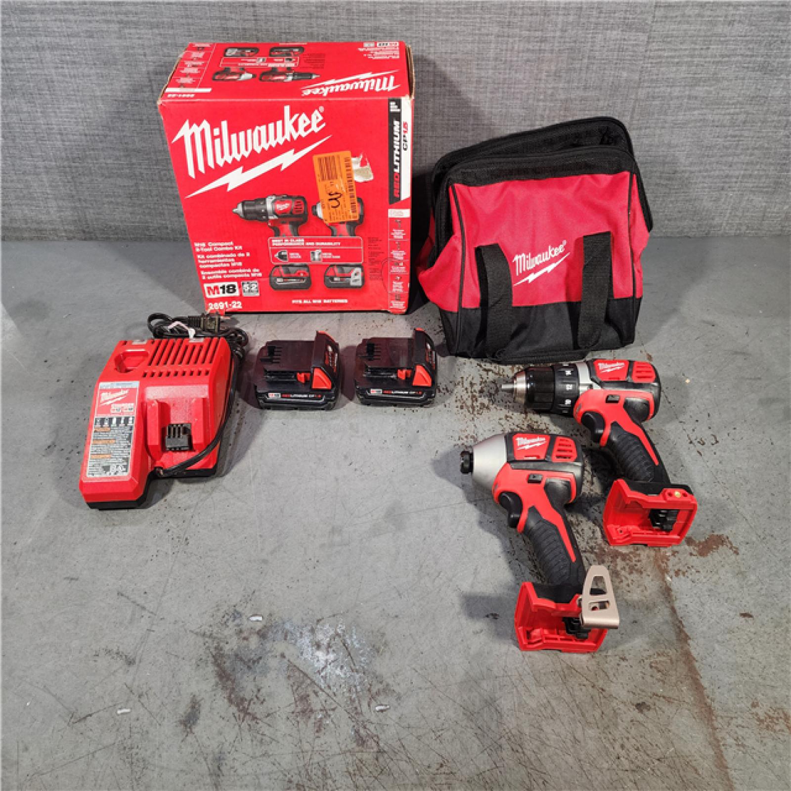 HOUSTON LOCATION - AS-IS Milwaukee M18 18V Cordless Brushed 2 Tool Drill/Driver and Impact Driver Kit