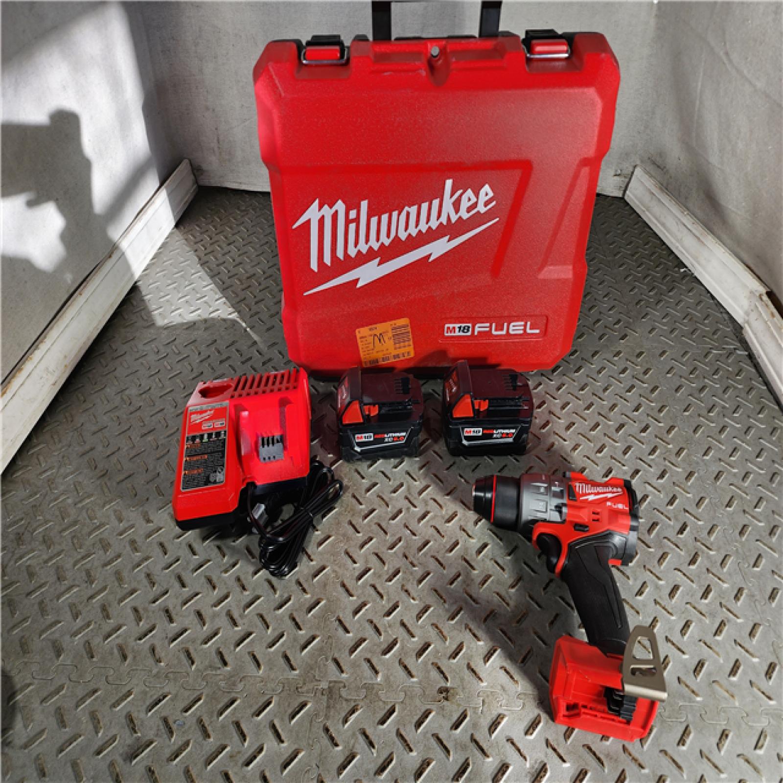 HOUSTON LOCATION - AS-IS (APPEARS LIKE NEW) Milwaukee 2904-22 Hammer Drill Driver Kit with Batteries  Charger & Tool Case  Red