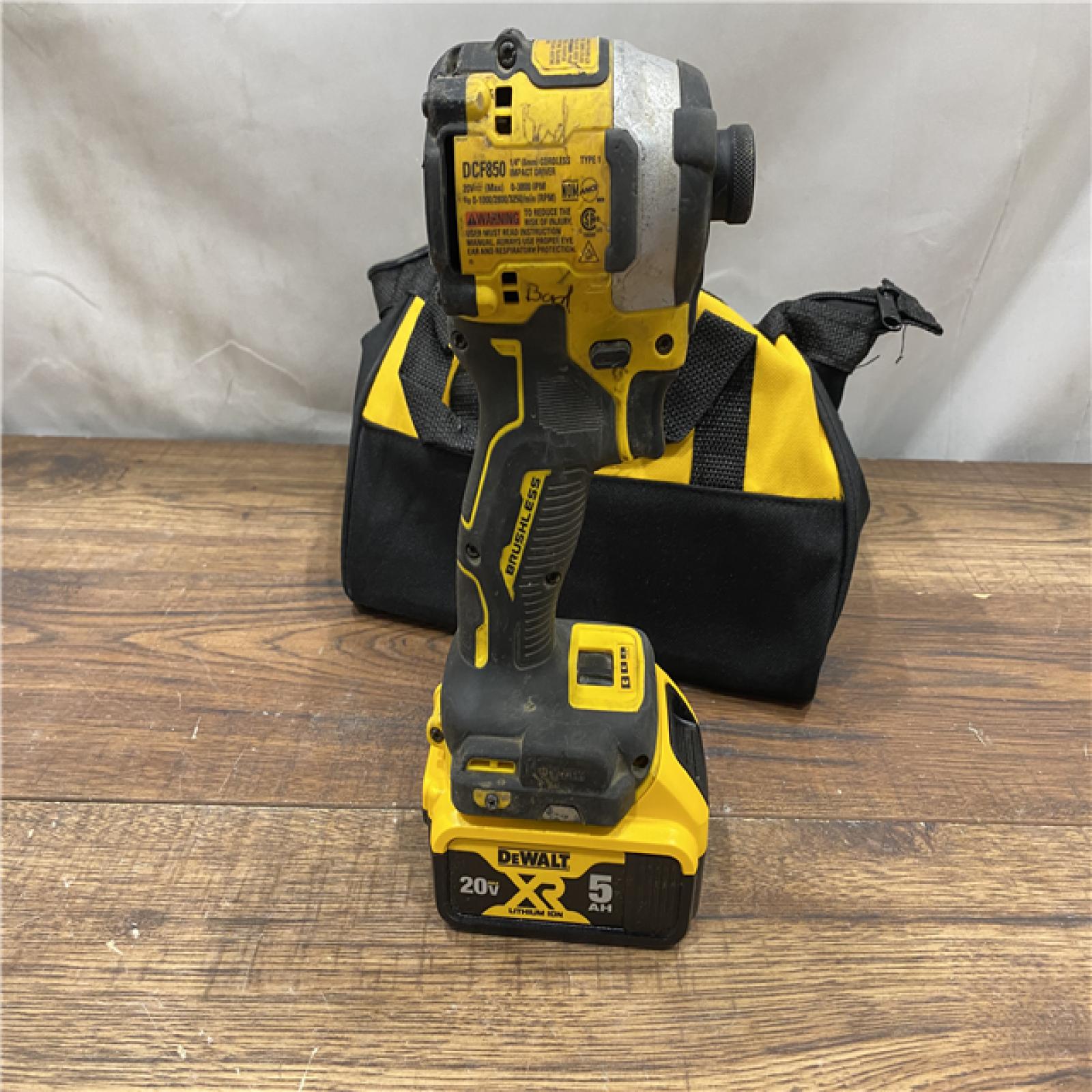 AS IS DEWALT ATOMIC 20V MAX Lithium-Ion Cordless 1/4 in. Brushless Impact Driver Kit, 5 Ah Battery, Charger, and Bag