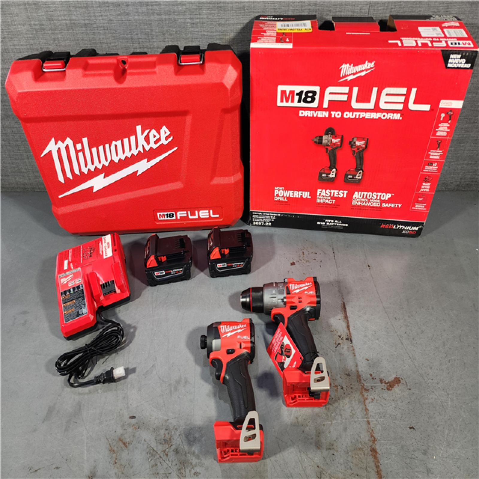 HOUSTON LOCATION - AS-IS (APPEARS LIKE NEW) Milwaukee M18 FUEL 18V Lithium-Ion Brushless Cordless Hammer Drill and Impact Driver Combo Kit (2-Tool) with 2 Batteries