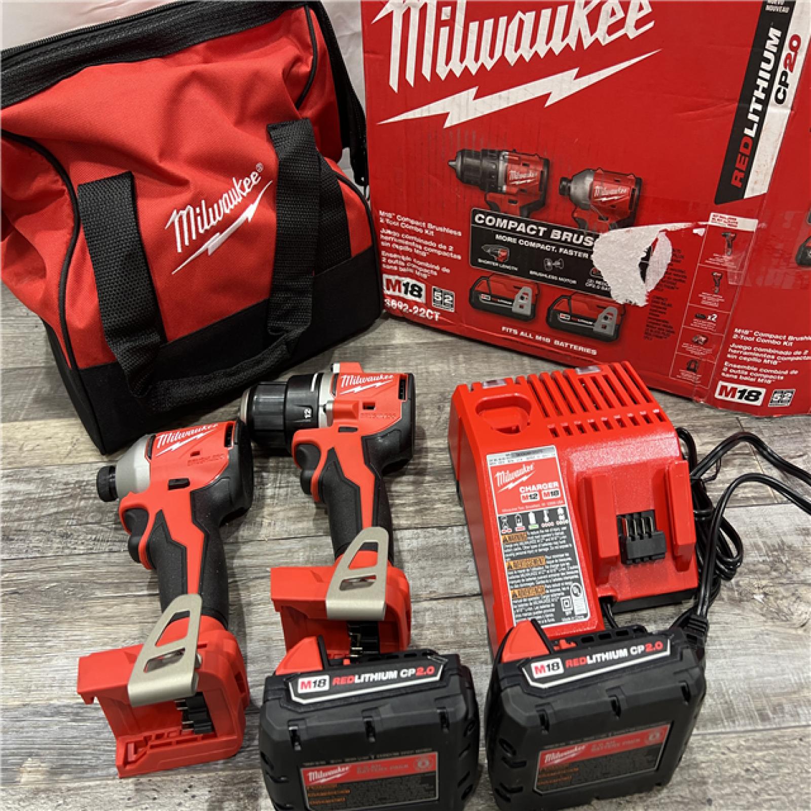 AS-IS MILWAUKEE M18 18V Lithium-Ion Brushless Cordless Compact Drill/Impact Combo Kit (2-Tool) W/(2) 2.0 Ah Batteries, Charger & Bag