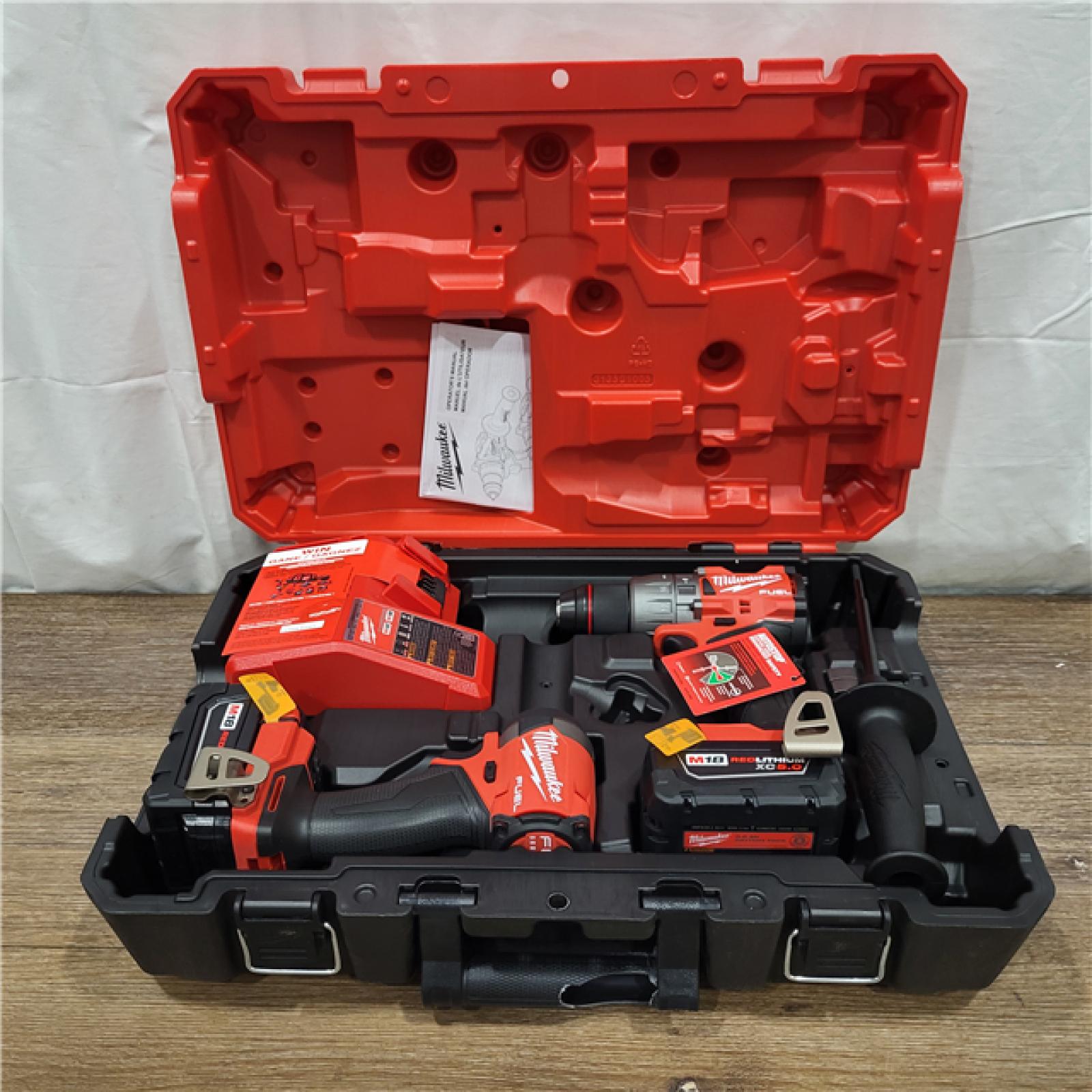 AS-IS M18 FUEL 18V Lithium-Ion Brushless Cordless Hammer Drill and Impact Driver Combo Kit (2-Tool) with 2 Batteries