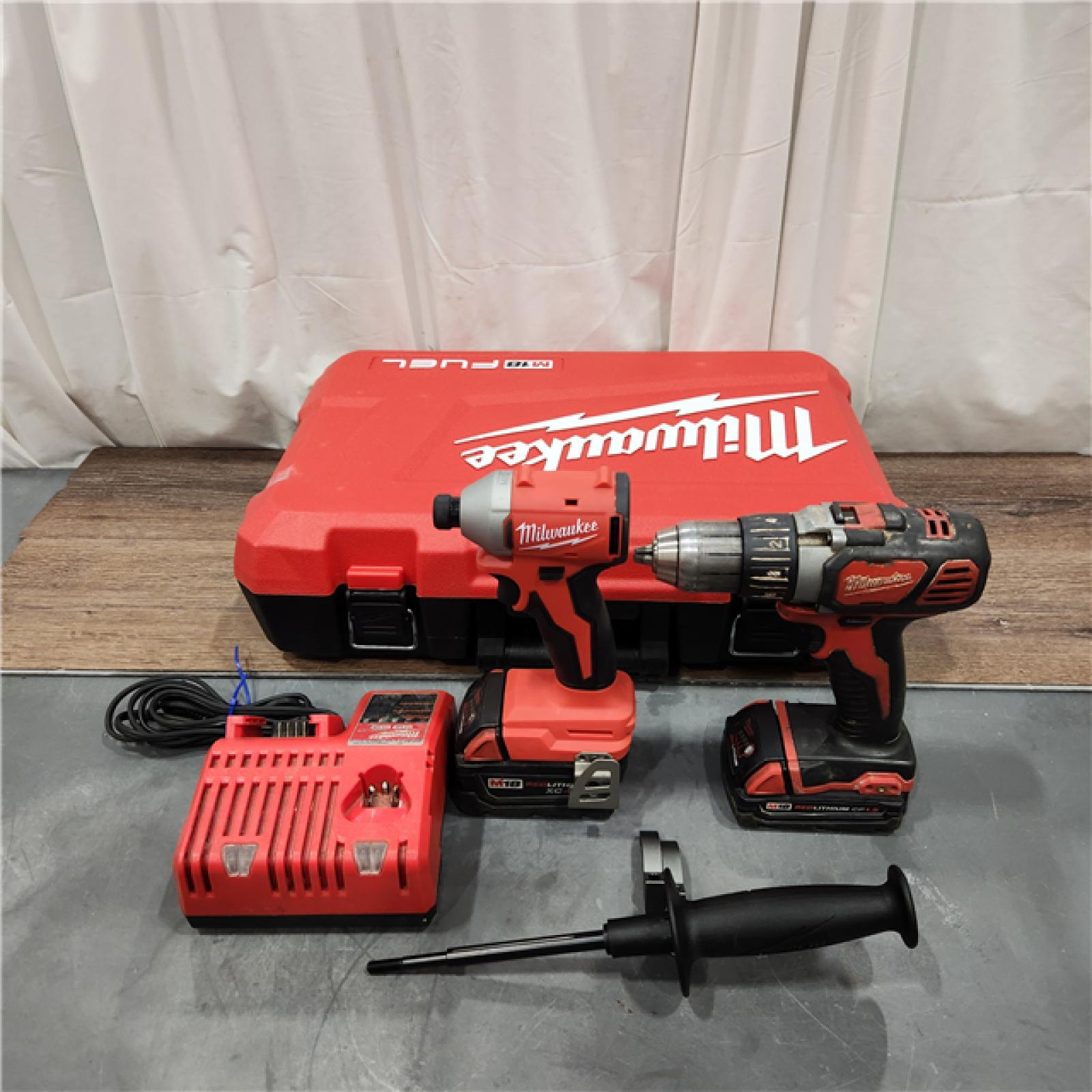 AS IS Milwaukee 2904-22 Hammer Drill Driver Kit with Batteries  Charger & Tool Case  Red