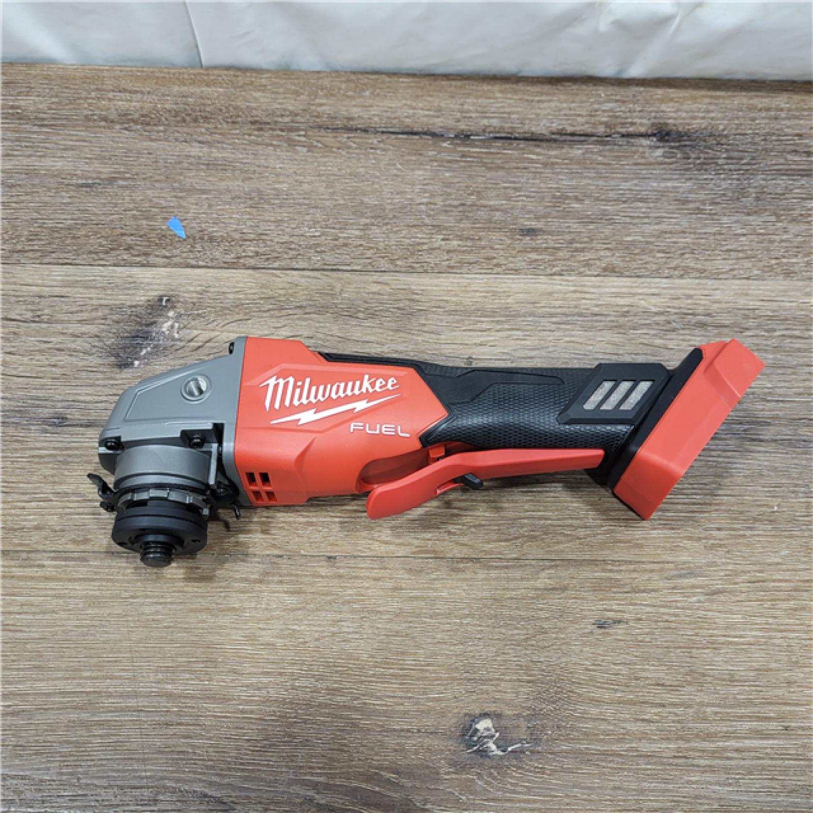 AS-IS Milwaukee 2880-20 M18 FUEL 18-Volt Lithium-Ion Brushless Cordless 4-1/2 in./5 in. Grinder W/Paddle Switch (Tool-Only)