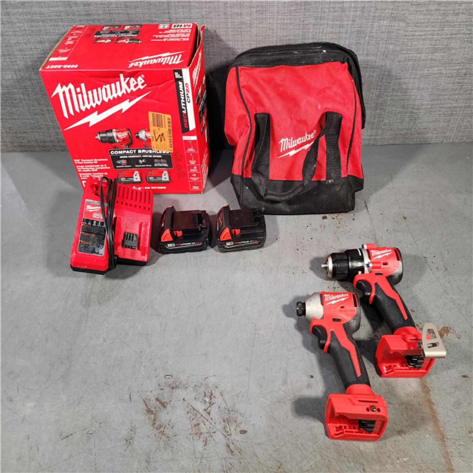 HOUSTON LOCATION - AS-IS M18 18V Lithium-Ion Brushless Cordless Compact Drill/Impact Combo Kit (2-Tool) W/(2) 2.0 Ah Batteries, Charger & Bag