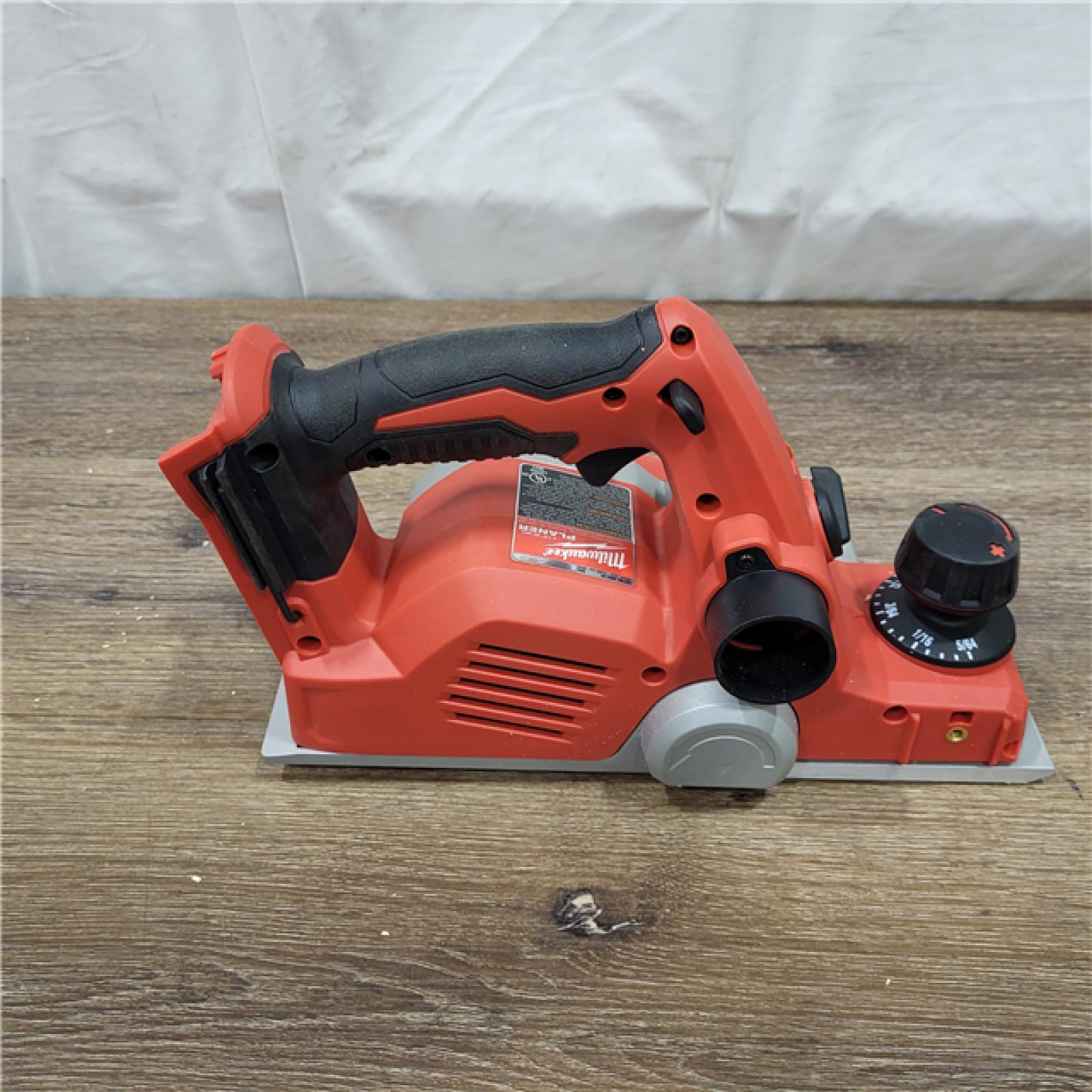 AS-IS Milwaukee M18 18-Volt Lithium-Ion Cordless 3-1/4 in. Planer (Tool-Only)