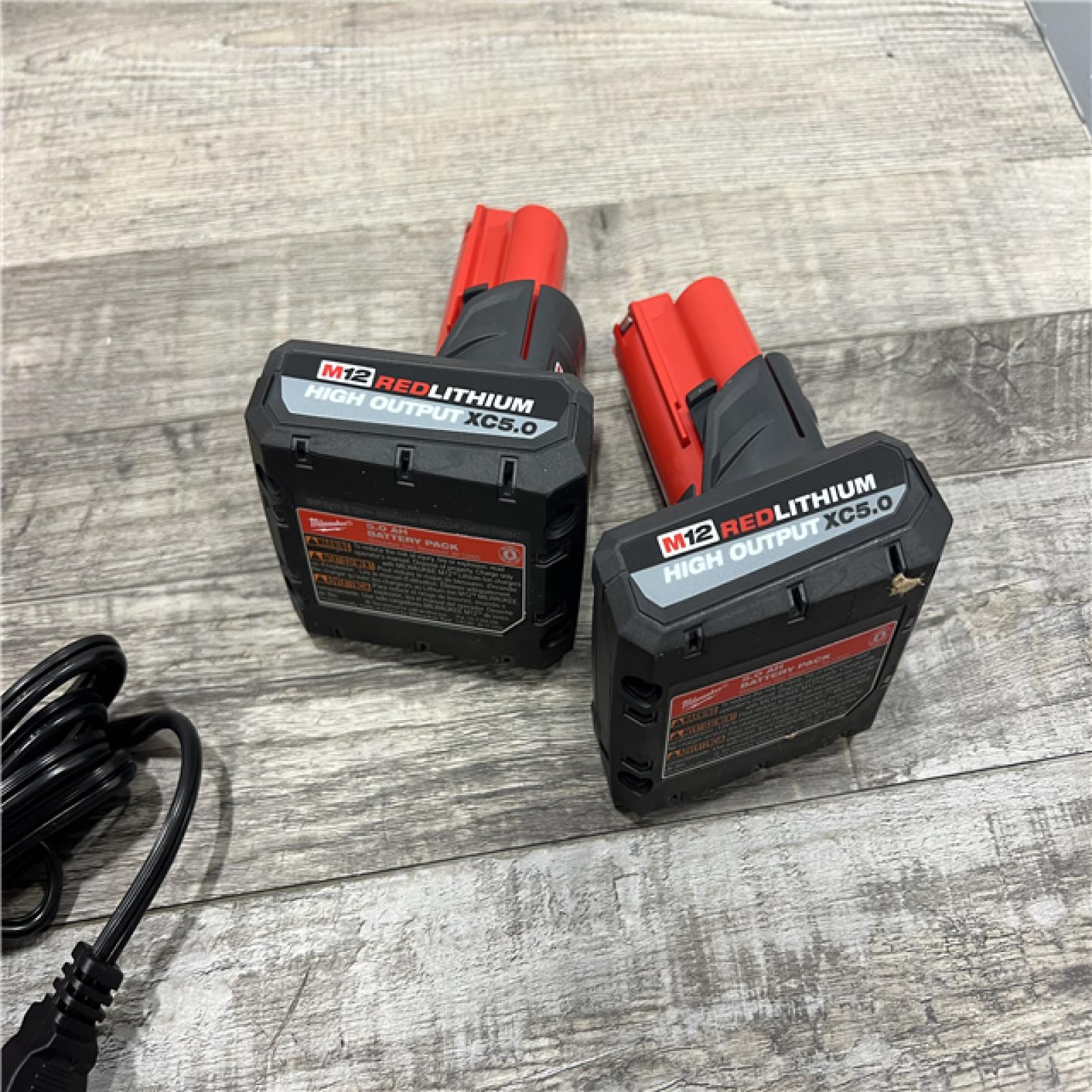 AS-IS Milwaukee M12 12V Lithium-Ion XC High Output 5.0 Ah Battery Pack (2-Pack) Starter Kit with Charger