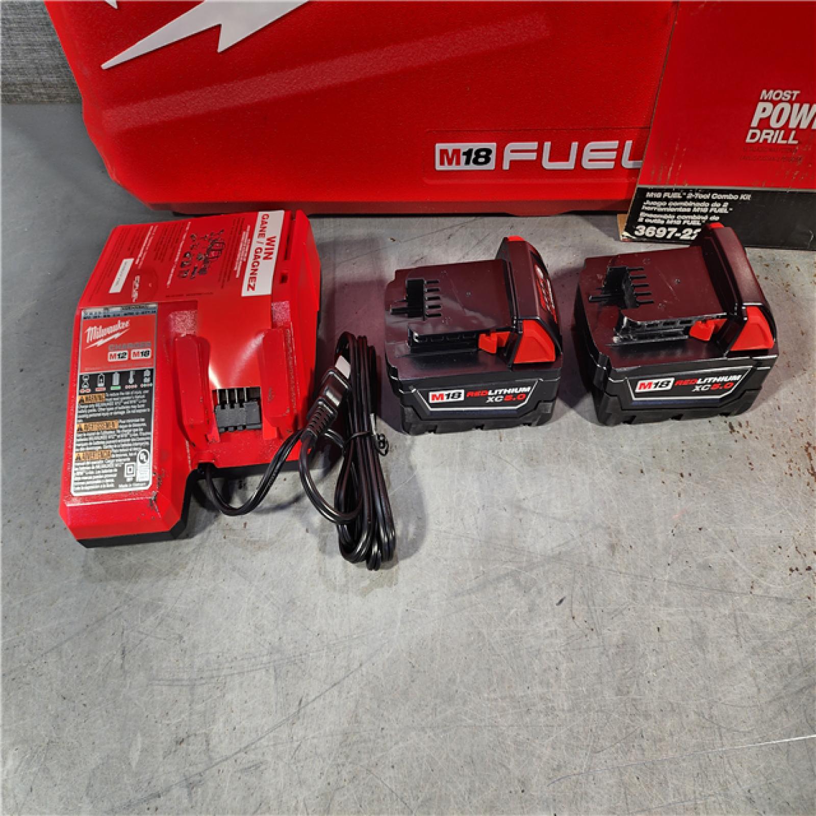 HOUSTON LOCATION - AS-IS (APPEARS LIKE NEW) Milwaukee M18 FUEL 18V Lithium-Ion Brushless Cordless Hammer Drill and Impact Driver Combo Kit (2-Tool) with 2 Batteries