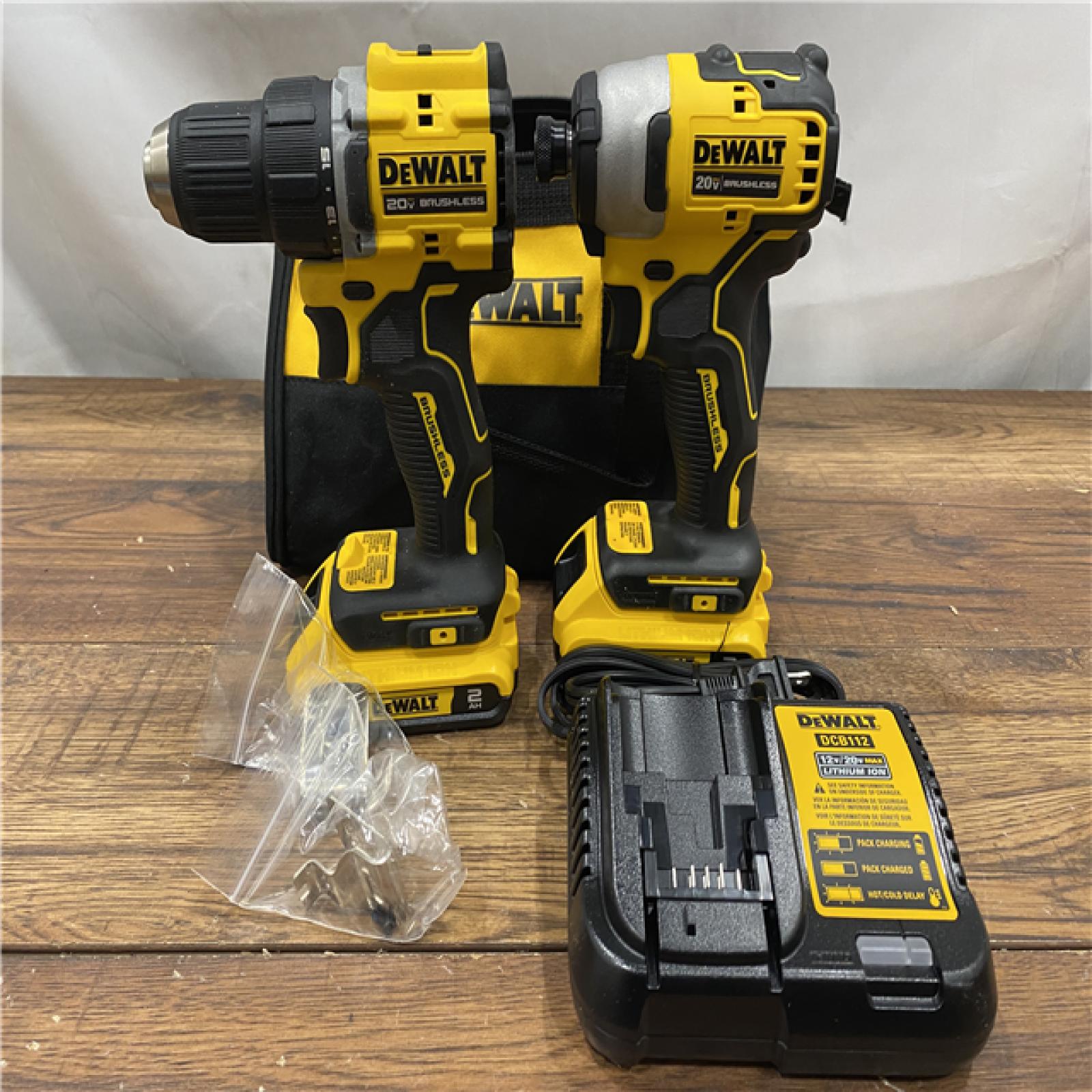 AS IS Dewalt DCK225D2 20V MAX ATOMIC Brushless Compact Lithium-Ion 1/2 in. Cordless Drill Driver and 1/4 in. Impact Driver Combo Kit with 2 Batteries 2 Ah