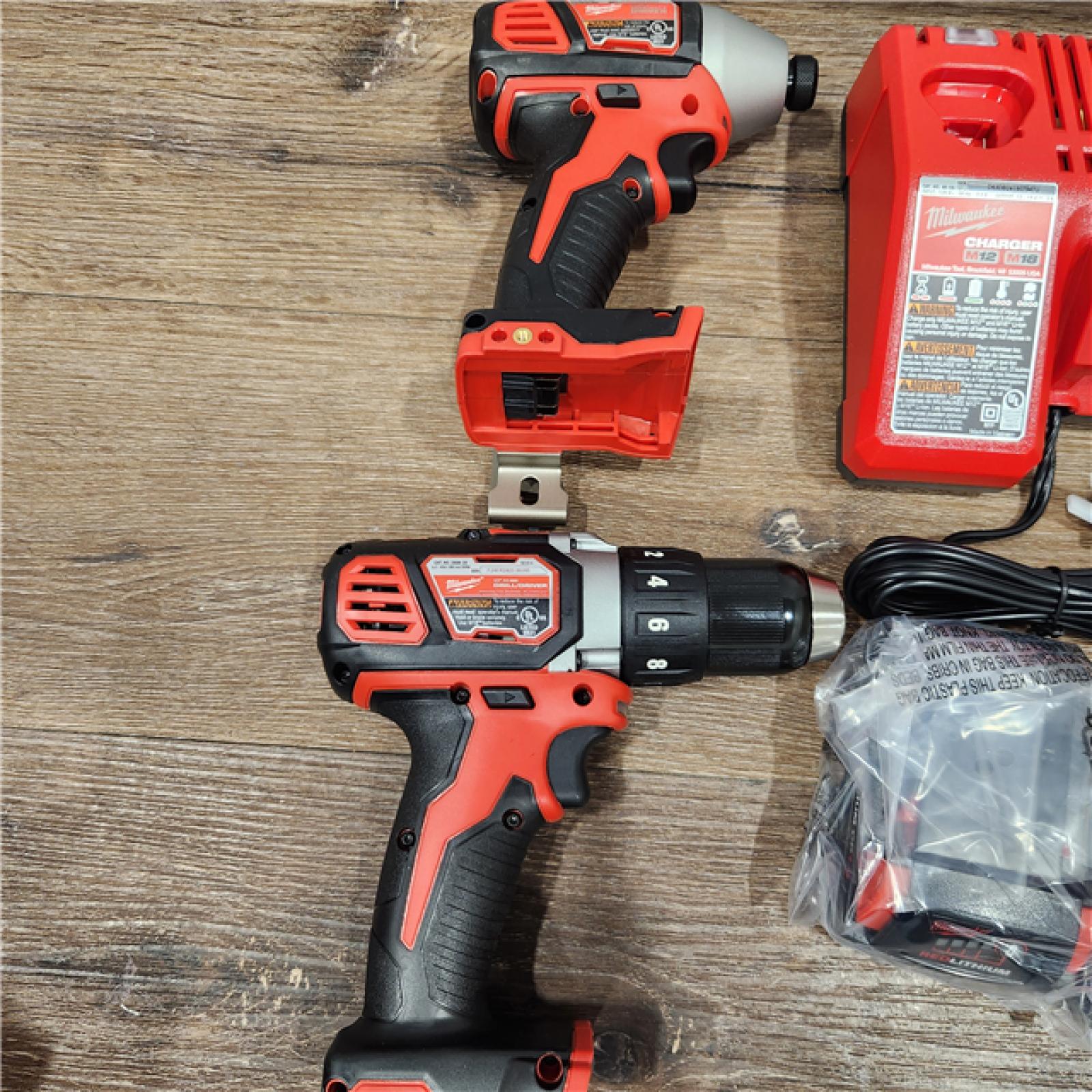 AS-IS Milwaukee M18 18V Cordless Brushed 2 Tool Drill/Driver and Impact Driver Kit