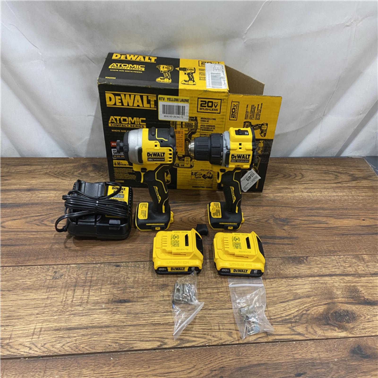 AS IS Dewalt DCK225D2 20V MAX ATOMIC Brushless Compact Lithium-Ion 1/2 in. Cordless Drill Driver and 1/4 in. Impact Driver Combo Kit with 2 Batteries 2 Ah