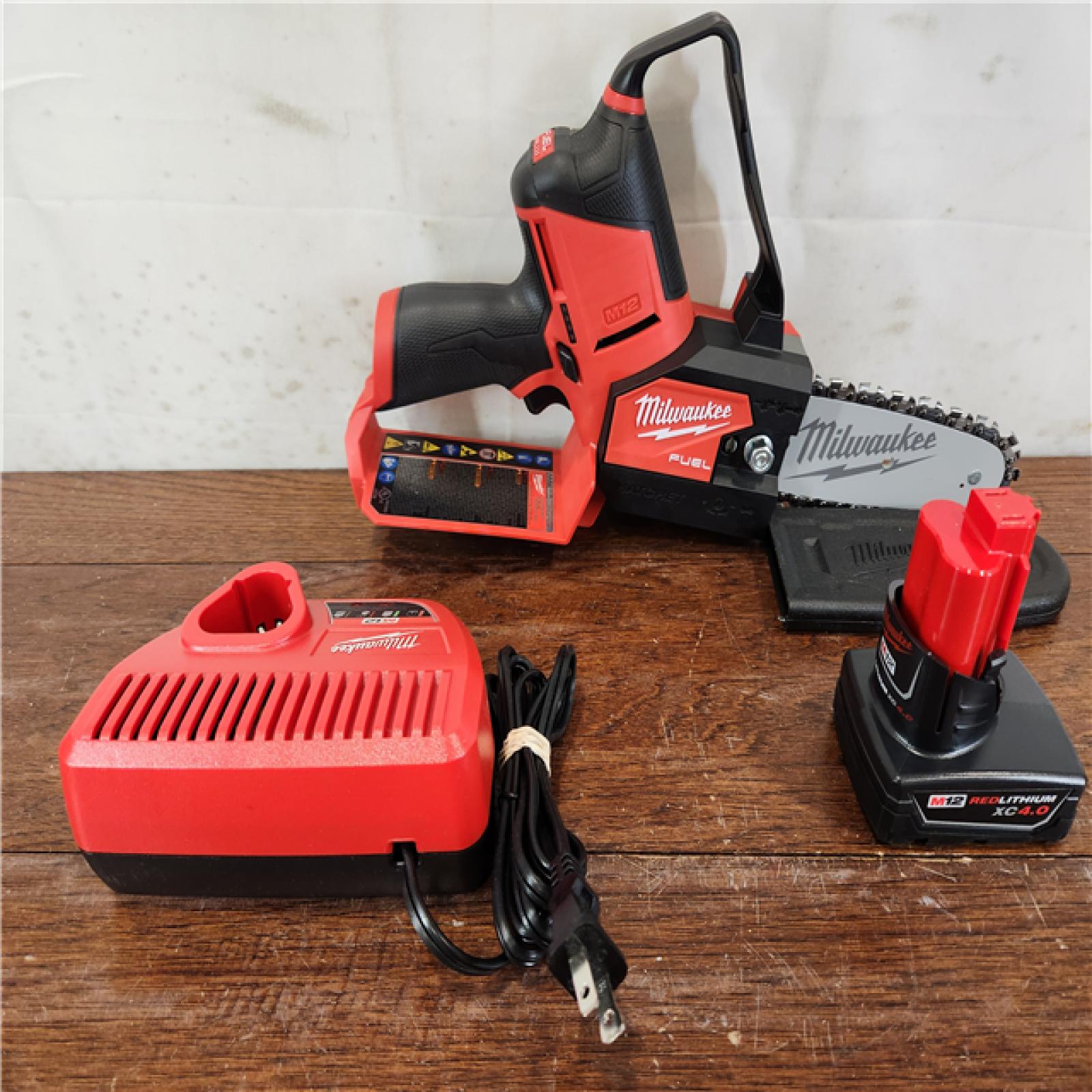 AS-IS Milwaukee M12 FUEL Lithium-Ion Brushless Cordless 6 in. HATCHET Pruning Saw Kit