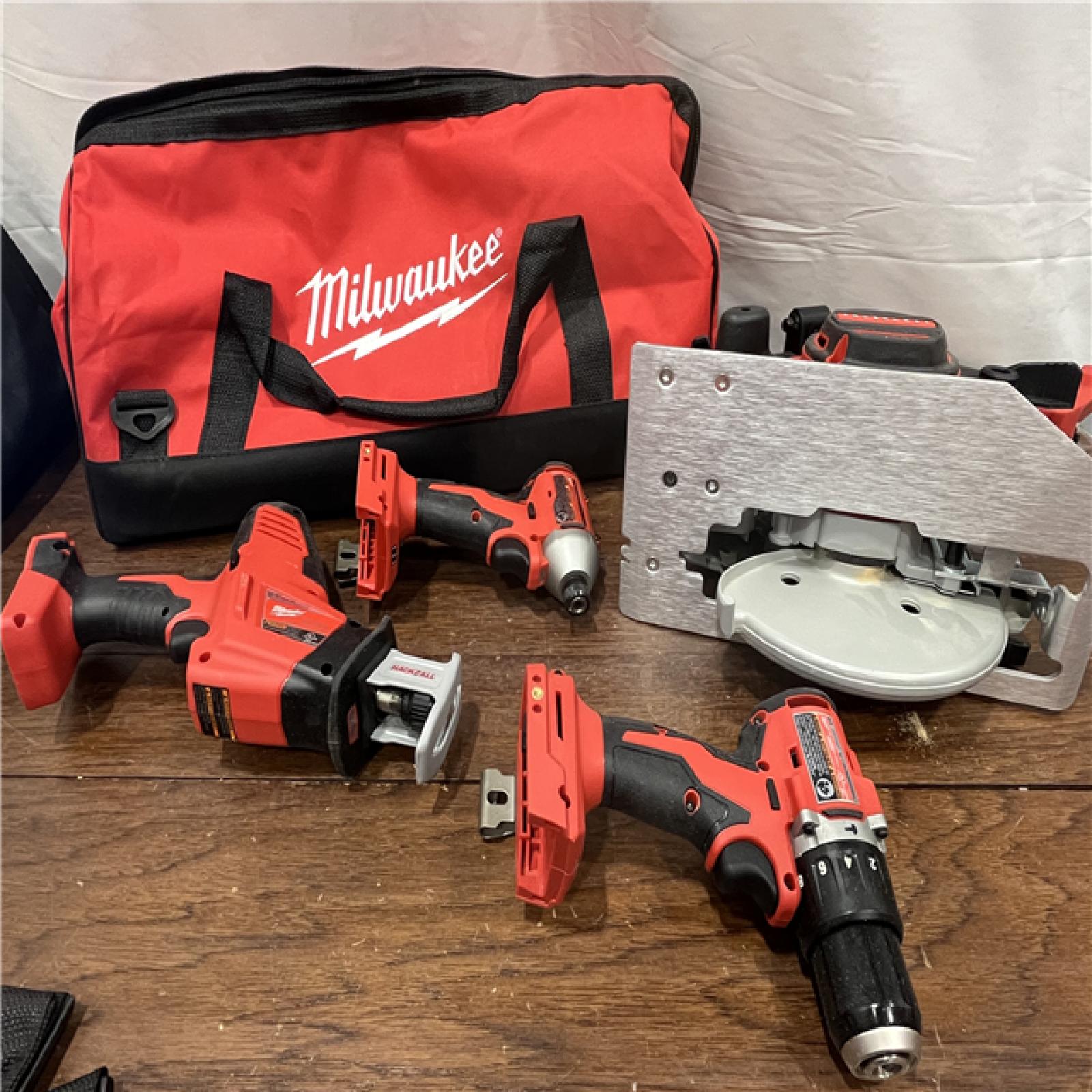 AS-ISMilwaukee M18 18-Volt Lithium-Ion Brushless Cordless Combo Kit (4-Tool) with 2-Batteries, 1-Charger and Tool Bag