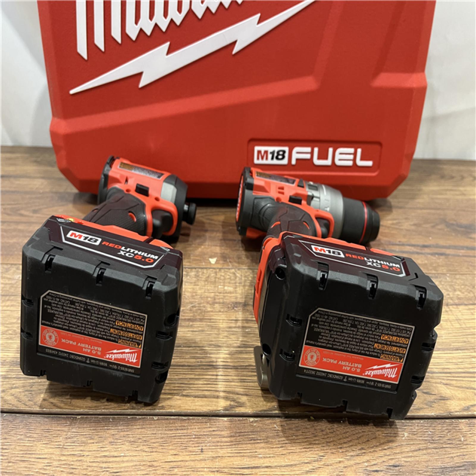 AS IS Milwaukee M18 FUEL 18V Lithium-Ion Brushless Cordless Hammer Drill and Impact Driver Combo Kit (2-Tool) with 2 Batteries