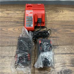 AS-IS Milwaukee M18 18-Volt Lithium-Ion XC Starter Kit with Two 5.0Ah Batteries / Charger (48-59-1852B)