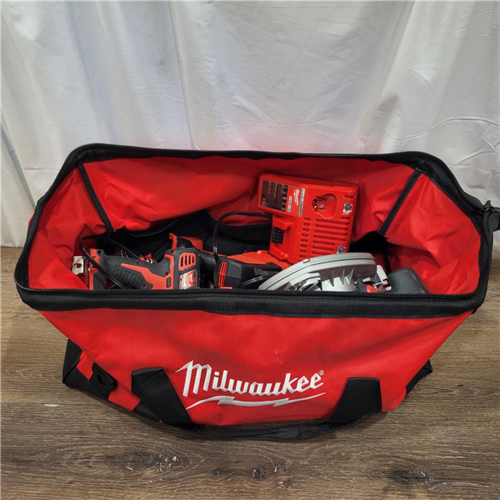 AS-IS Milwaukee M18 18-Volt Lithium-Ion Cordless Combo Tool Kit (5-Tool) with (1) 3.0Ah and (1) 1.5Ah Battery, (1) Charger, (1) Tool Bag