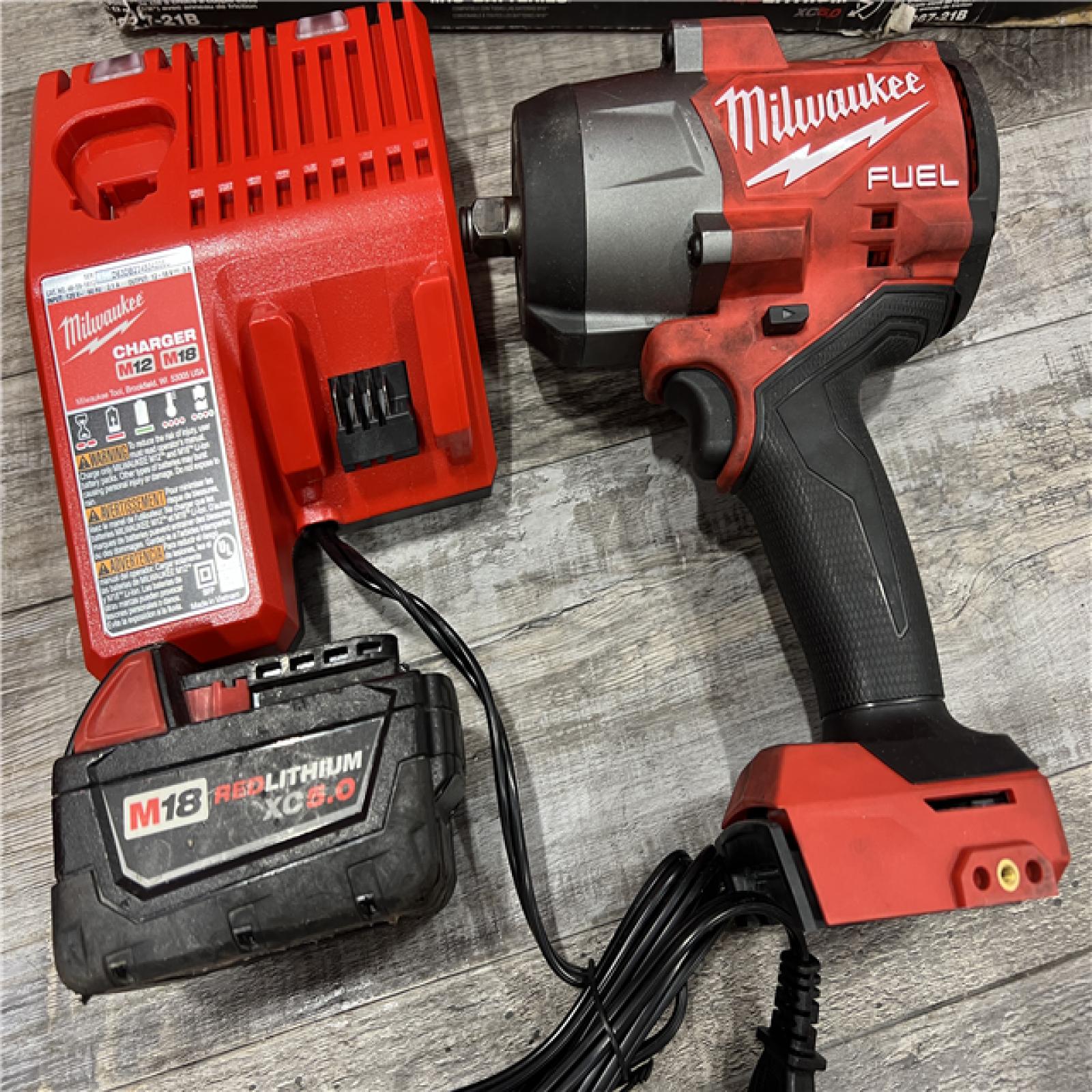 AS-IS Milwaukee 2967-21B M18 FUEL 1/2 High Torque Impact Wrench W/ Friction Ring 5.0Ah Kit