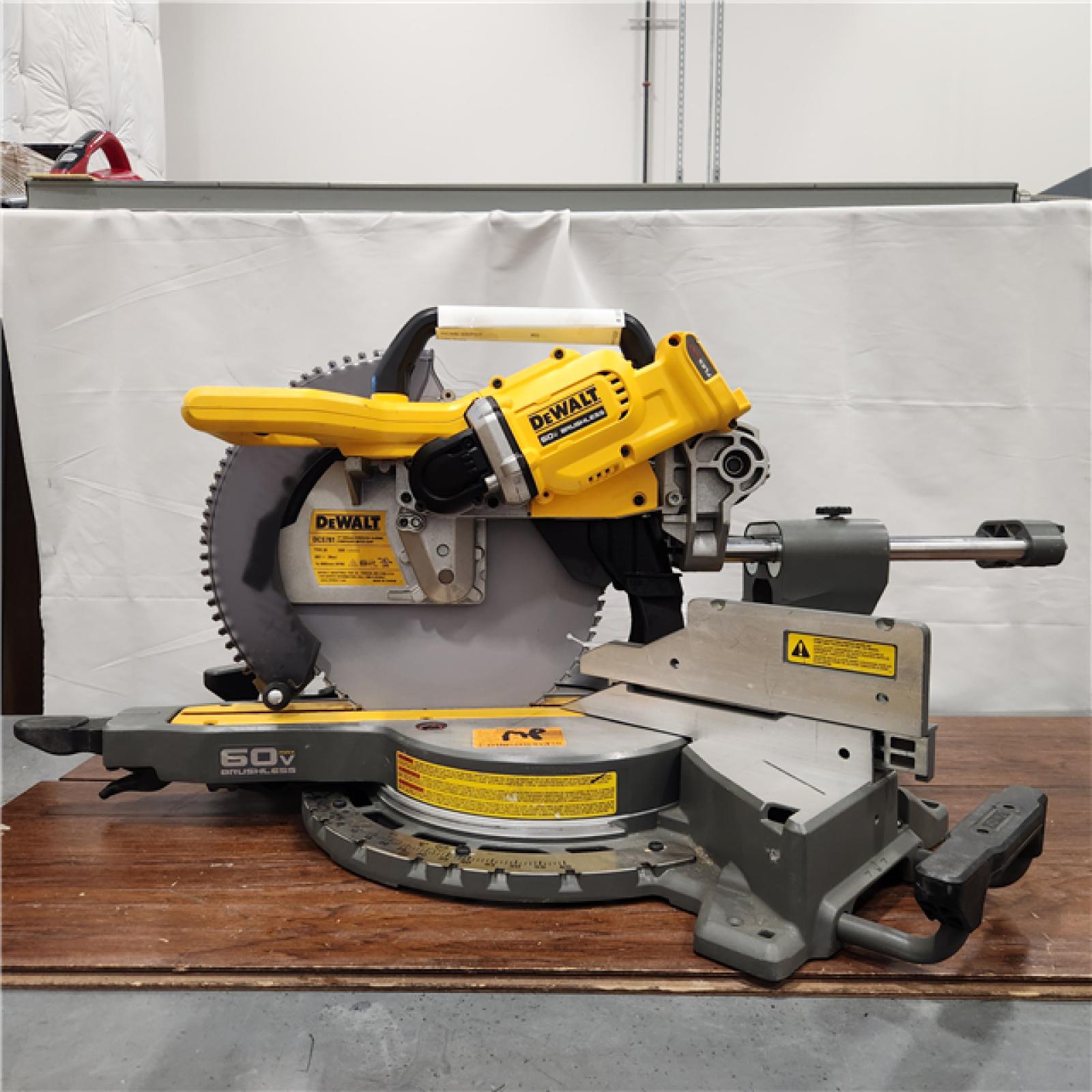 AS-IS DEWALT 60V Lithium-Ion 12 in. Cordless Sliding Miter Saw (Tool Only)