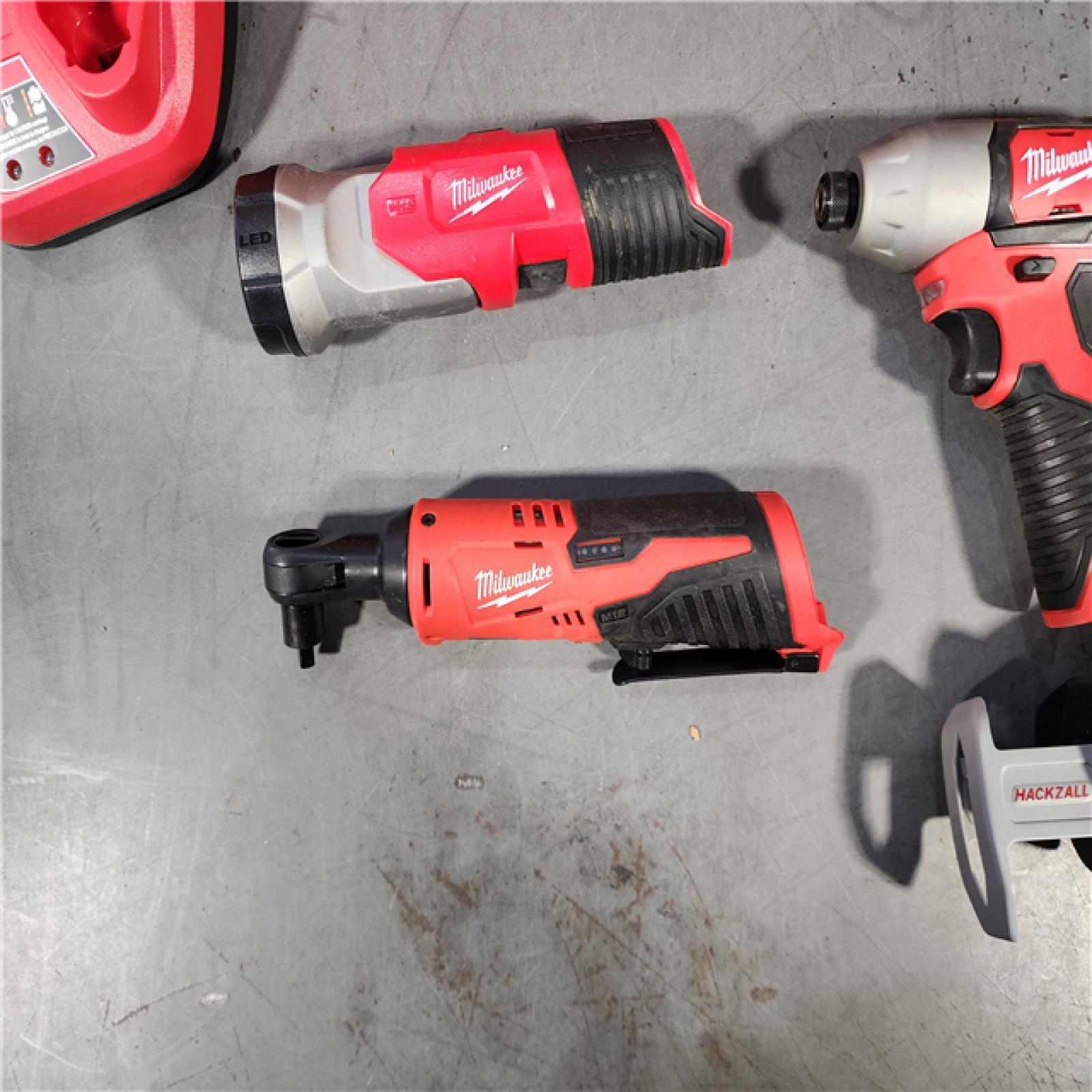 HOUSTON LOCATION - AS-IS MILWAUKEE M12 12V Lithium-Ion Cordless Combo Kit (5-Tool) with Two 1.5Ah Batteries, Charger & Tool Bag