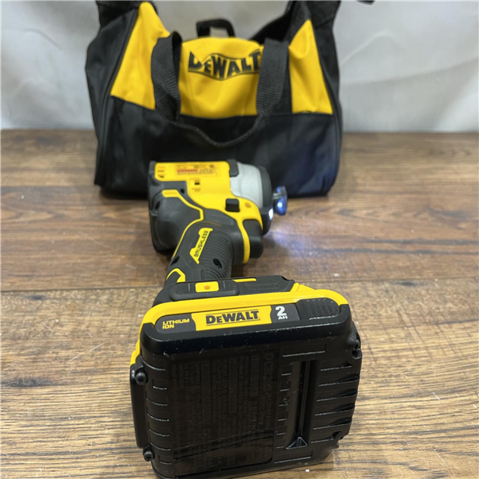 AS IS DEWALT ATOMIC 20V MAX* Brushless Cordless Compact 1/4 in. Impact Driver Kit