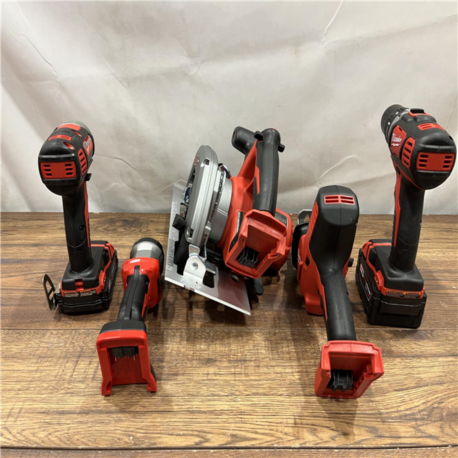 AS IS Milwaukee M18 18-Volt Lithium-Ion Cordless Combo Tool Kit (5-Tool) with (1) 3.0Ah and (1) 1.5Ah Battery, (1) Charger, (1) Tool Bag