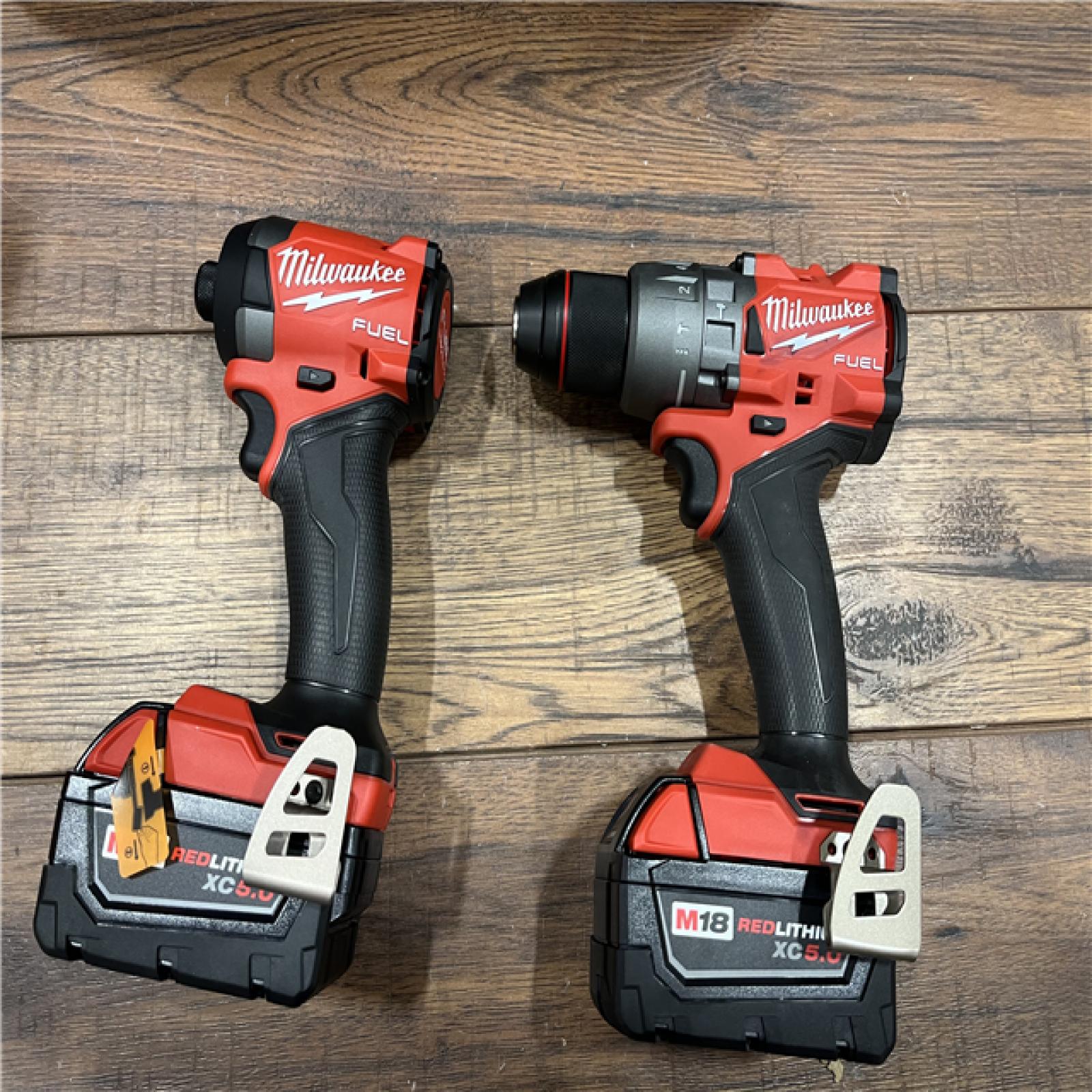 AS-IS Milwaukee M18 FUEL 18V Lithium-Ion Brushless Cordless Hammer Drill and Impact Driver Combo Kit (2-Tool) with 2 Batteries