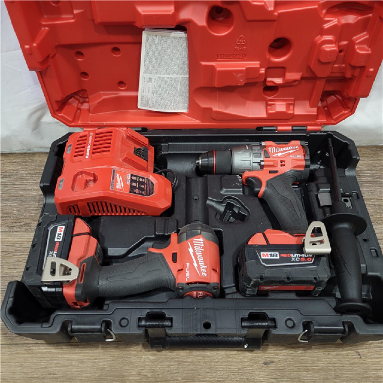 AS-IS Milwaukee M18 FUEL 18V Lithium-Ion Brushless Cordless Hammer Drill and Impact Driver Combo Kit (2-Tool) with 2 Batteries