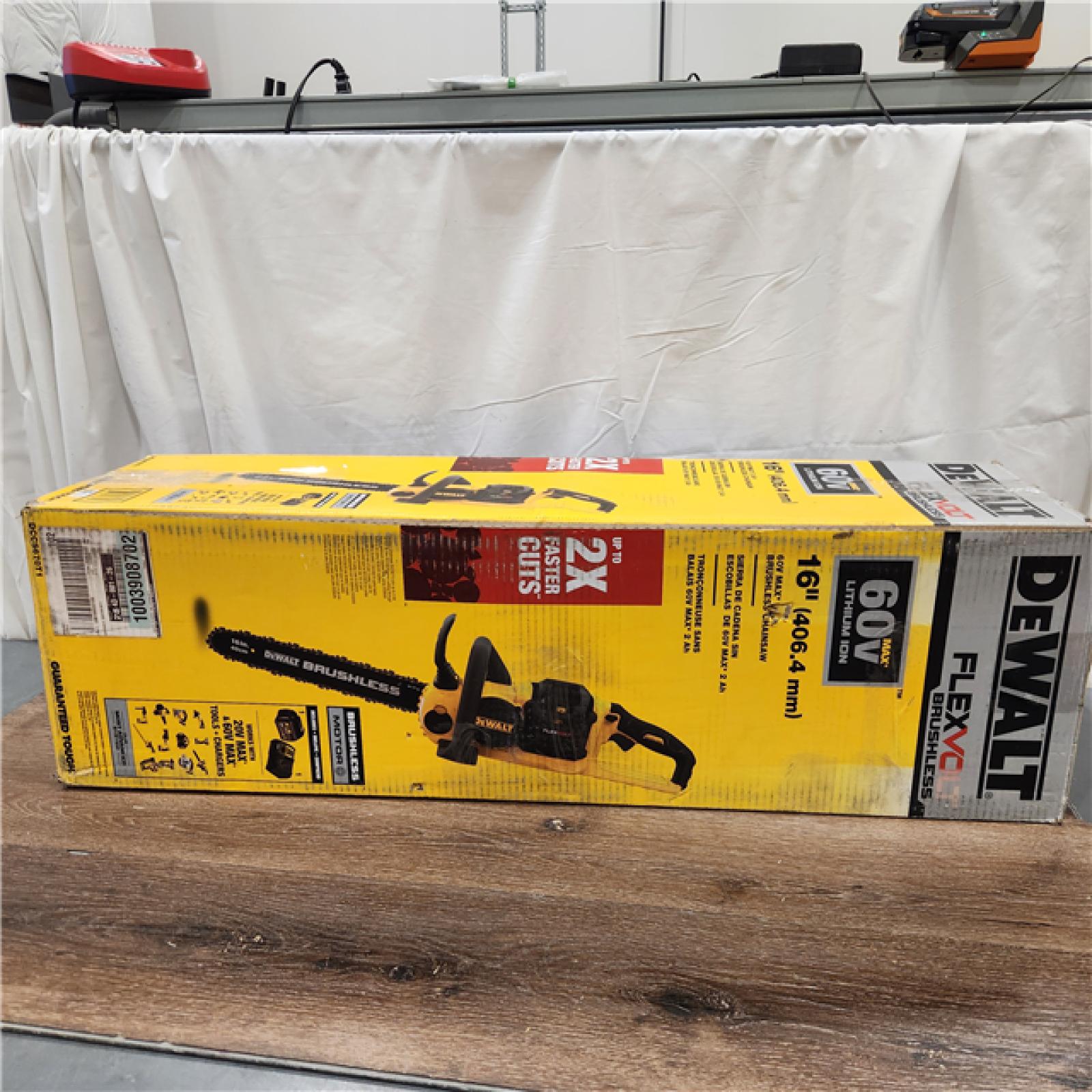 AS-IS DEWALT  FLEXVOLT 60V MAX 16in. Brushless Cordless Battery Powered Chainsaw Kit with (1) FLEXVOLT 2 Ah Battery & Charger